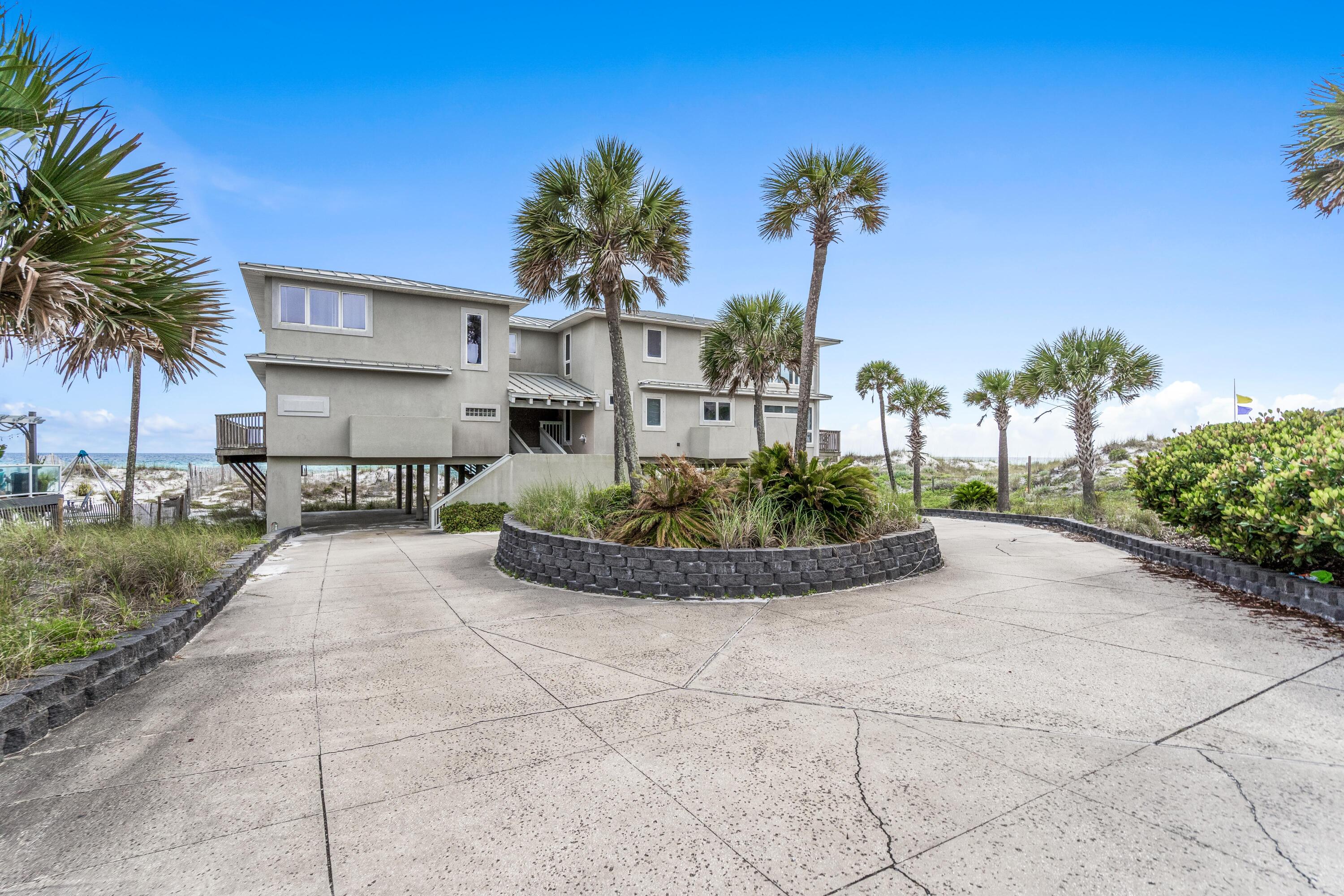 This property is a rare beach duplex fully furnished for vacation rental on a private beach lot that allows each side to be sold separately. The duplex could be removed and a new duplex 
or single family home built..  Property being sold 'AS-IS'.
Buyer could rent out one side and keep one side for personal use while waiting on new plans. 
RENTAL ESTIMATES POTENTIAL $400,000 per YR
FOR BOTH SIDES