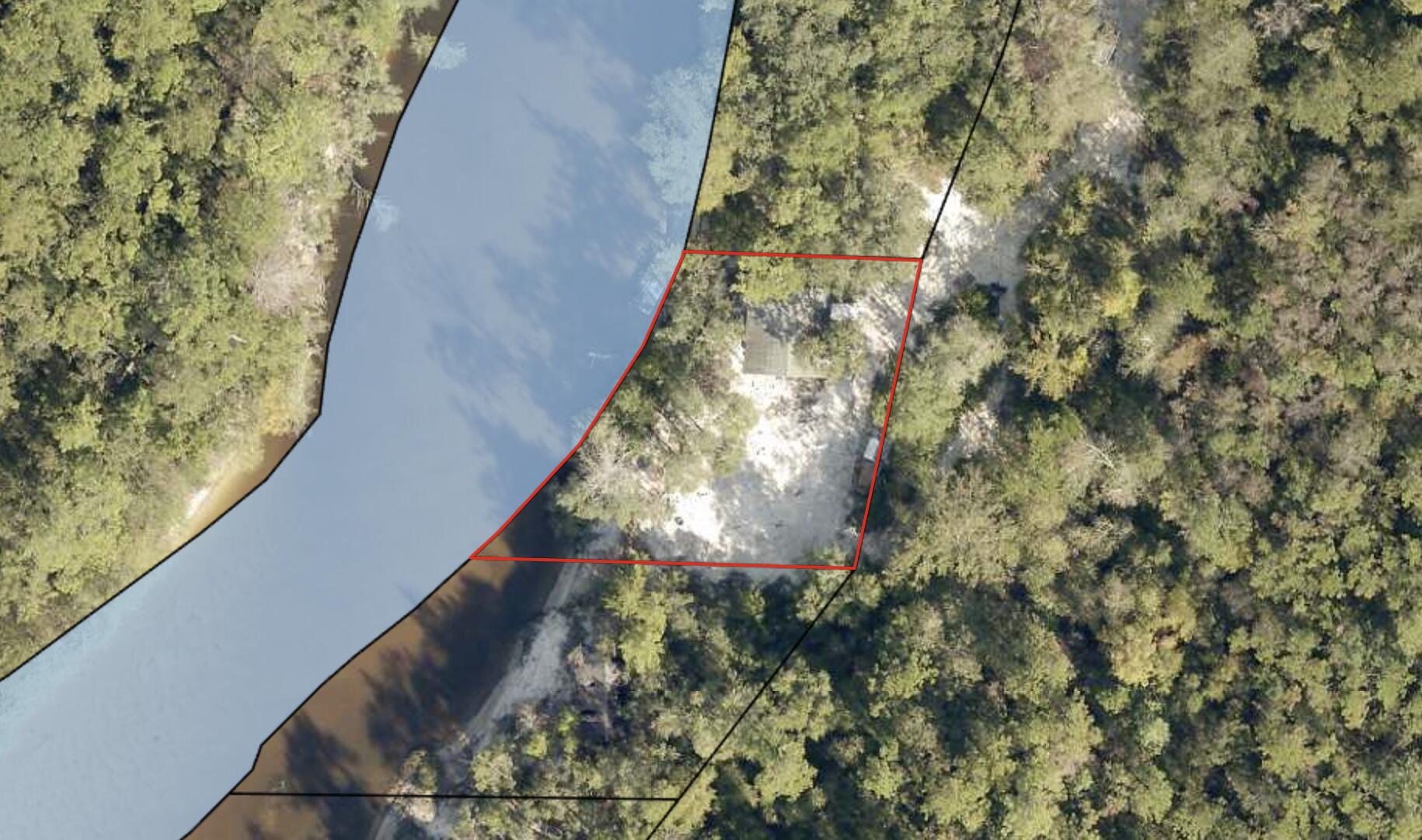 Riverfront property! Set up your fishing camp just minutes from town. Bring the family and enjoy nature at it's finest.