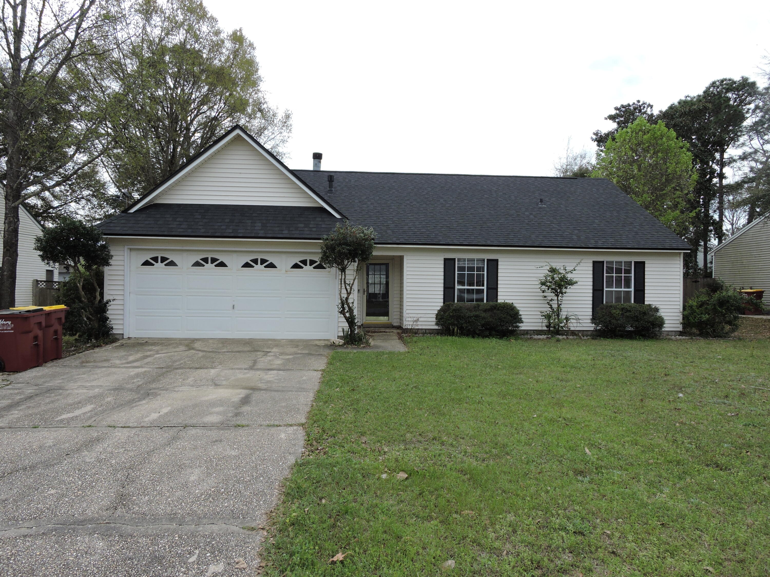 Located South of I-10, freshly panted throughout in agreeable gray walls with white trim.  The home has 4 bedrooms/2 baths with 2 car garage.  The home welcomes guests with cathedral ceilings in the family room accented with a wood burning fireplace and tile flooring throughout the main floor.  The kitchen features ample cabinet and counter space and kitchen island with gas stove.  The master suite features large walk in closets and dual vanities.  The additional bedrooms are ample sized with nice walk in closets in the down stairs bedrooms.  The home has a privacy fenced backyard with small storage building as well.  Schedule your private showing today!