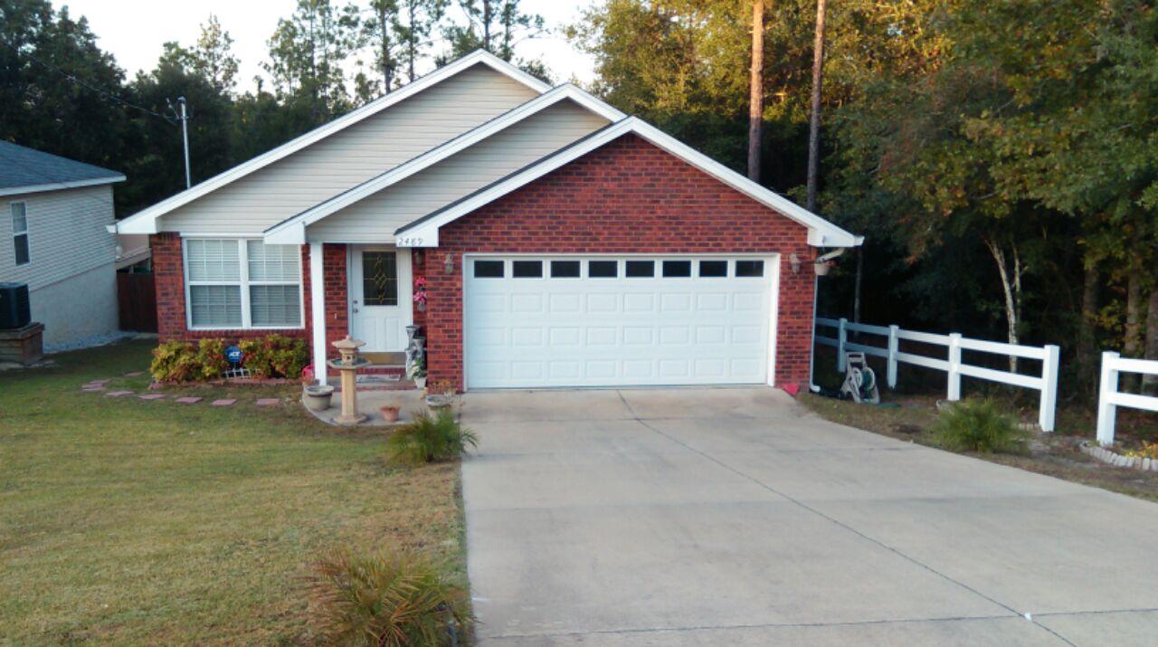 Available 05/06/2016....Cute Florida cottage style home with a custom touch. Country living with privacy advantages. Easy commute to bases beaches and shopping. 3/2 Floor plan with custom paint throughout the home. Electric fireplace for cozy Florida winters and open concept floor plan. Over 1371 sqft. of living space, large kitchen, eat in breakfast area, large master, and beautiful wood floors in the main living area. Corner lot is adjacent to woods for the adventurer at heart. Large outdoor open back deck overlooks wooded privacy. Partially fenced back yard is pet friendly. No inside smoking. Pets may be allowed with a $400 non-refundable pet fee.