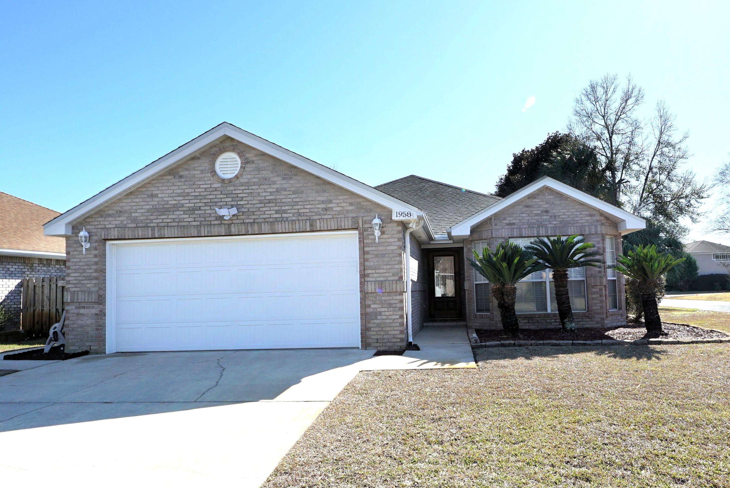 Move in ready!! This updated gorgeous all brick home sits on a corner lot in a quiet cul-de-sac in a highly desirable neighborhood and features low HOA fees!
This lovely home offers open floor plan and is highlighted by neutral paint tones throughout.  The spacious living room has elegant try ceilings, a cozy gas fireplace, and access to a covered back patio-perfect for grilling or relaxing in the privacy-fenced backyard with storage shed.
The large kitchen boasts newer appliances, ample cabinet and counter space, a pantry, breakfast bar, and dining area ideal for gatherings. The master suite includes tray ceilings, dual vanities and walk-in shower plus garden tub.  The home includes a wind-impact-rated garage door for added peace of mind. Just minutes from Eglin AFB (approx. 10 minutes) It is perfectly located just minutes from Eglin AFB (approx. 10 minutes), Hurlburt Field (approx. 13 minutes), local hospital, schools, shopping centers, and white sand beaches.

Recent updates include roof (2020), HVAC (2019), garage door (2022), water heater (2024), luxury vinyl plank flooring (2023), and carpets (2023).
