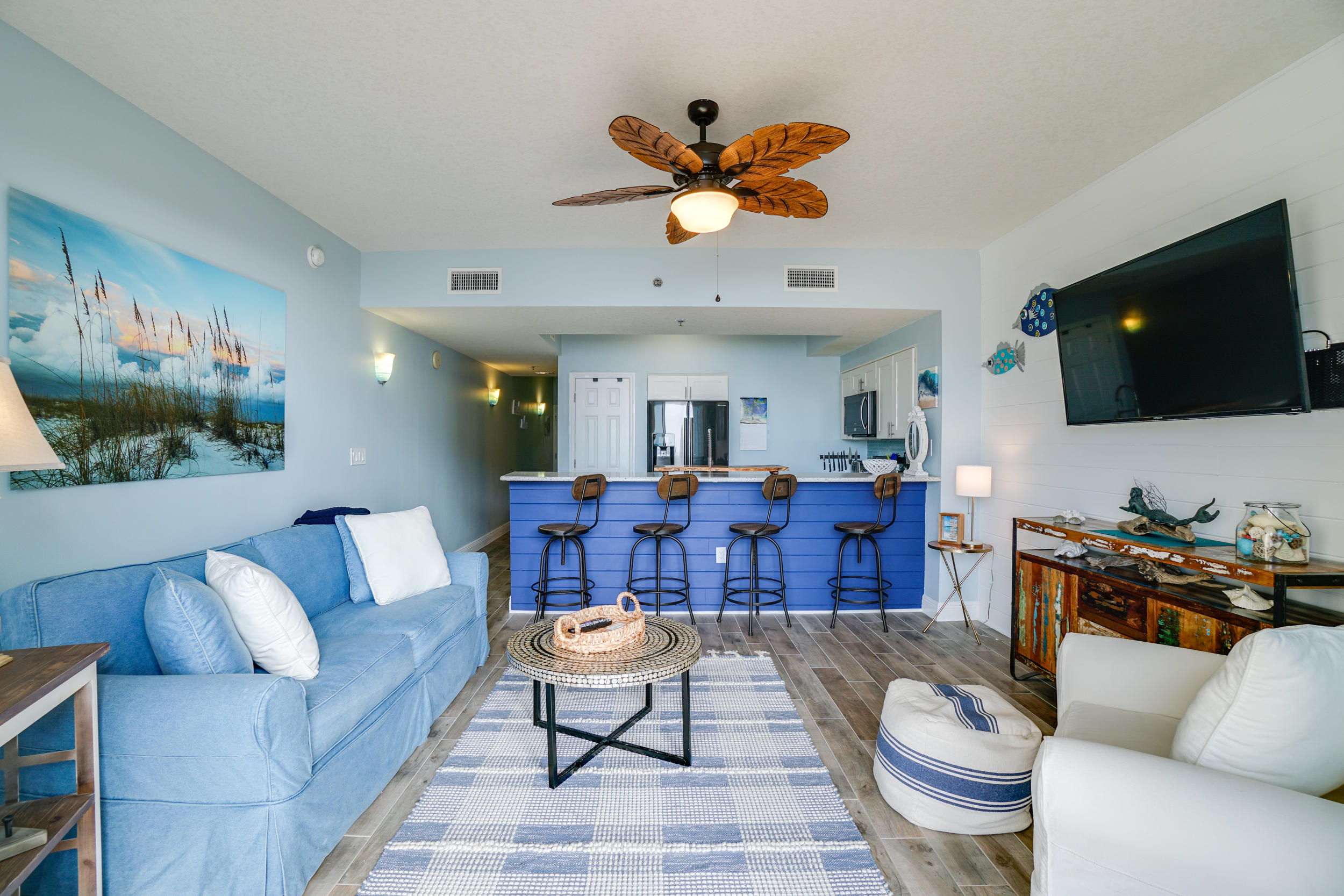 Luxe beach style and easy coastal living in this stunningly renovated 1 bedroom, 1.5 bath condo with arguably the best beach views in the building. So many upgrades including shiplap walls, tankless hot water heater, wood look tile floors throughout, updated lighting and fans, beachy chic furniture and dcor and a beautifully remodeled kitchen with countertops with recycled glass, a decorative tile backsplash and sleek black stainless steel appliances. The renovated bathrooms features unique vanities and a huge walk-in shower that is fully tiled with niche, rain shower head and seamless glass door. This condo comes fully furnished and equipped. All you need is your bathing suit! Ariel Dunes is situated near the best stretch of Miramar Beach's white sand beach. Enjoy the resort style amenities of Ariel Dunes including: 24,000 sf of pools (4)with seasonally heated areas, tennis, on-site restaurant ''Cabana Cafe'', 18-hole on-site golf course and pro shop, 8 tennis courts, gated and secure access from Highway 98 and Scenic Gulf Drive and 2,000 feet of beautiful deeded beach! You and your guests will also enjoy the newly opened Seascape Towne Center with wonderful dining, shops and entertainment all within a quick walk or car ride without exiting the property.