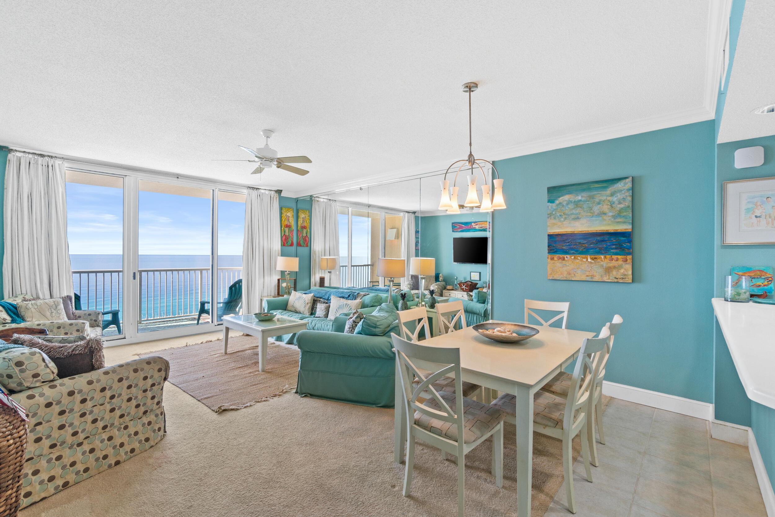 The beach getaway you have always dreamed of - a beach inspired 2/2 Gulf front condo at Majestic Beach Towers. Whether you are ready to live on the beach or invest in a rental property, this is the perfect condo for you! Gorgeous Riveting Gulf views are framed by beachy chic interiors, designed with the Gulf of Mexico and sun in mind. Sunshine and warm gulf breezes abound from the generous balcony, with amazing water and beach views. This fresh, ultra clean, meticulously maintained, turnkey offering has all of the extras and will convey fully furnished, decorated, and rental ready. This condo had never been on a rental program. It lives larger than its square footage and is spacious and bright. Enjoy the good life at Majestic Beach with an unparalleled deck of resort style amenities including: 650 linear feet of sugar white GULF FRONTAGE, Four Large outdoor pools (2 at Tower I and 2 at Tower II), Two Indoor heated pools (one in Tower I and one in Tower II), Two hot tubs, Baby pool, Wading pool with waterfall, H20 Bar and Grill serving Gulfside/Poolside lunch and dinner, Large outdoor dining area, State of the Art Fitness center, 130 seat Stadium seating Movie Theatre, Convention center, Private Owner's Lounge with full Kitchen, Tennis Courts, Majestic Market featuring Starbucks coffee. Quick distance to the wonderful shopping, dining and entertainment at Pier Park. FROM THIS CONDO, YOU ARE WITHIN STEPS OF EVERYTHING YOU COULD EVER WANT AT THE BEACH!