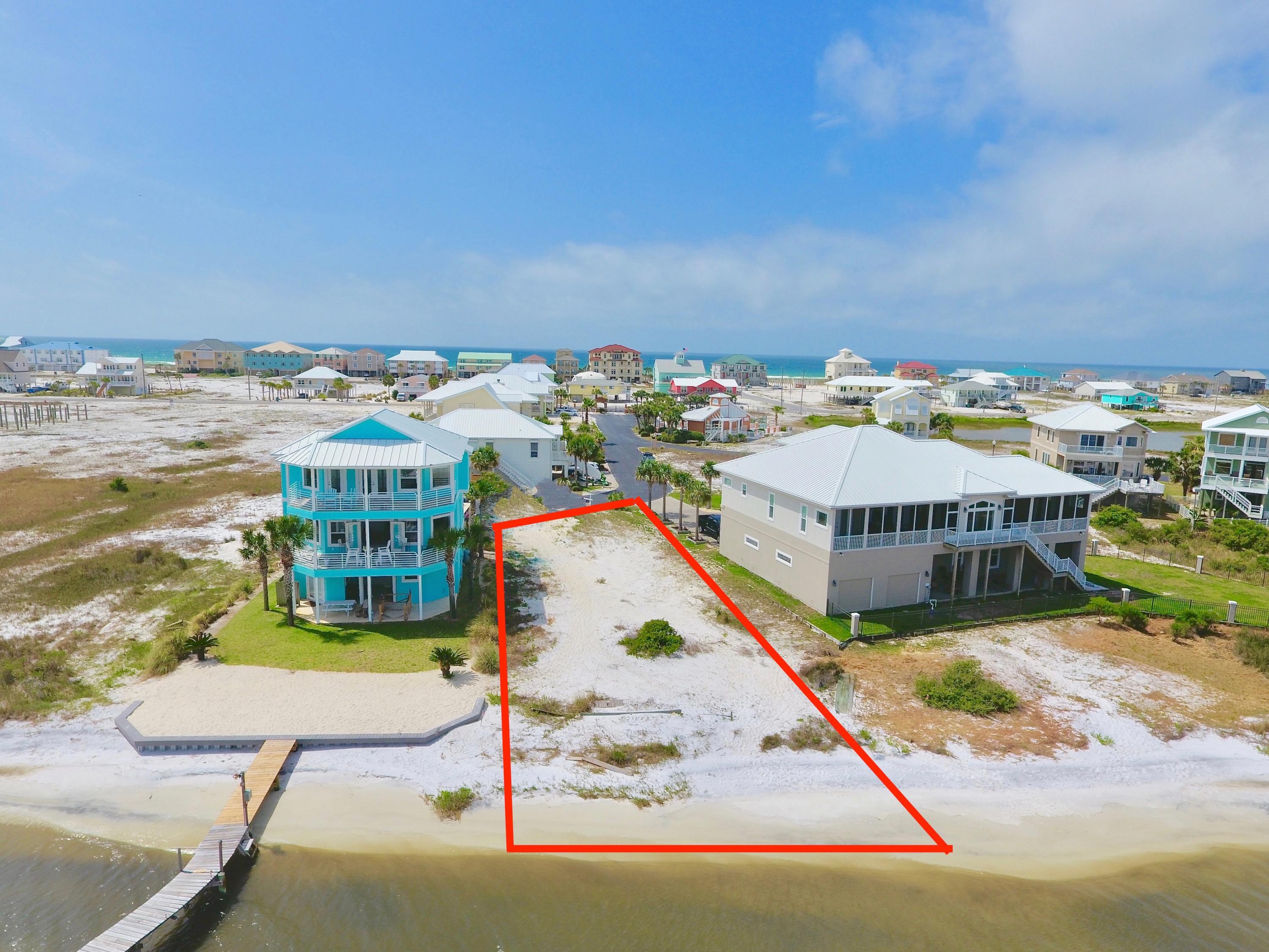 AMAZING WATERFRONT LOT, 2ND LARGEST LOT in Caribbean Isles at .37 Acres! Look no Further to Build your Waterfront Dream Home! Enjoy Tremendous Views of the Santa Rosa Sound and Partial Gulf Views. Buildable and Available Waterfront Lots are Becoming a Rarity on Navarre Beach and the Navarre Area, Don't Miss this Opportunity! Caribbean Isles is a Gated and Well-Maintained Community Equipped with Community Pool, Street Lights, Sauna, and Tennis Courts.  Enjoy a Clutter Free Environment with Underground Utilities. Owning a Waterfront Lot on the Sound Provides Great Liberty to Indulge in Numerous Water Activities such as Boating, Paddle Boarding, Kayaking, Fishing, Jet Skiing and so much more! Living on the Santa Rosa Sound is Truly an Amazing Experience, that Gives Owners... Unforgettable Sunrises and Sunsets, Views, Endless Leisure, Watch the Fish Jump, Dolphins Play, and Feel the Vibes, Beach Front Living at its Finest! This Lot is Very Private with only Two Homes on Either Side, so Beach Traffic will be Low!

Navarre Beach is one of the last places with the old Florida feel and is home to Florida's Longest Fishing Pier. Enjoy Crowd free beaches, Emerald Green Waters and Miles of Sugar White Sandy Beaches, Walking & Biking Trails, a Fishing pier, Gulf Island National Seashore to the West and County Owned Park to the East for Additional Activities to Enjoy.