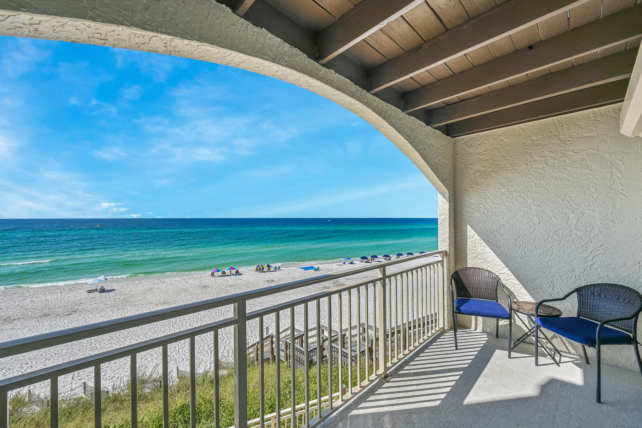 You must see this GULF-FRONT townhome with nearly $100K already on the books for 2023, (an 80% occupancy rate for the year of 2023)  residing on a 25 ft bluff and boasting 100 feet of private beach. Aptly coined 'Rush to the Beach,' this gorgeous unit in Seagrove Beach will have you continuously 'rushing back' to the sugar white sand. Upon initial entry, the hallway leads to the expansive main living and dining area offering sweeping views of the famed turquoise hued waters. The fully renovated kitchen features a brand-new luxury appliance suite, granite countertops, new fixtures, and custom cabinetry. The living area is flanked with a coastal chic flair anchored by the aged-oak flooring, new furnishings and ship-lap accents. The adjoining arched terrace is perfect for admiring the new palate of mesmerizing hues provided by the renowned Emerald Coast sunsets each and every night. Flooded with natural light, the 2 master suites on the 2nd level enjoy beautiful views and newly renovated en-suites. The top floor loft quarters boast two custom built-in queen-size beds with wood accents and a newly installed AC unit.

The low-density community of Seagrove Dune Villas is tucked away in the heart of Seagrove Beach sprawling on nearly two acres. The complex is well maintained and is in the process of completing some updates which include adding dedicated golf-cart parking on the north lawn, landscaping rejuvenation, and gating the entry - all of these improvements will continue to modernize the community as a whole with no planned or current special assessments. The culmination of luxury and exclusiveness creates a truly intimate setting while remaining geographically poised near all of the acclaimed dining and entertainment venues 30A has to offer, and is just one mile east of Seaside! Impressive rental potential with projections over $130,000 per year and basically all-inclusive dues makes this a compelling opportunity for both investors and second-home residents alike. The unit also conveys with hurricane shutters and a assigned parking spot with guest parking on the north side. Rental projections, approximate cost to own, and an update list available upon request. "Rush to the Beach" is offered fully furnished and turn-key. Inquire today to schedule a private viewing and start living the coastal lifestyle you deserve.