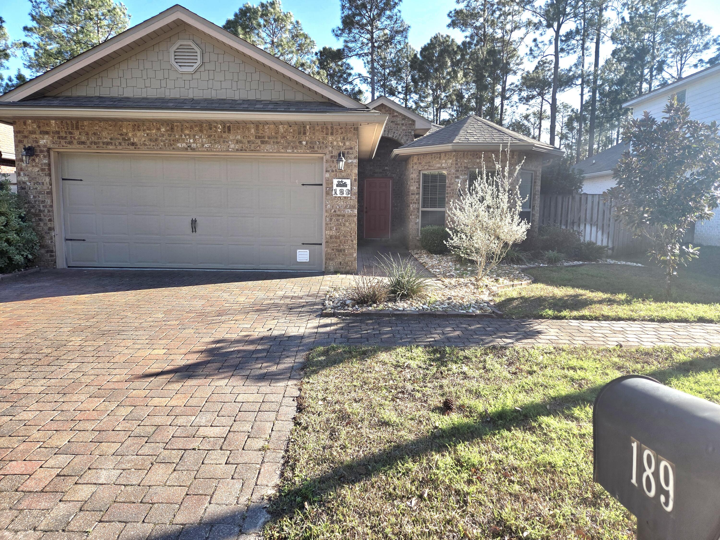 Under Contract-Kick-out Enjoy all one level living in Harstvedt Plantation, conveniently located off Chat Holley Rd, near South Walton High School and Highway 331. Quiet neighborhood with low HOA dues, walking distance to a bay front park. 4 Bedrooms offer room for your family and working from home. The 2-car garage with workbench has wall-mounted air and heat, and flat screen TV.  The paver driveway has room for 2 cars and there is parking for 2 more vehicles or a boat on the side driveway. The King Size Primary Suite has a large walk-in closet with custom built-ins and Garden Tub and separate shower. The kitchen has stainless steel appliances, granite countertops and a breakfast bar with pendant lighting.The laundry room/pantry has extra storage with custom built-ins as well as cabinets. The patio has a ceiling fan and wall-mounted TV for outdoor dining/entertaining. The back yard is fenced and large enough for a pool and there is even extra yard beyond the fence with a firepit. The storage shed stays and there is even a custom built storage unit for surf or paddle boards.