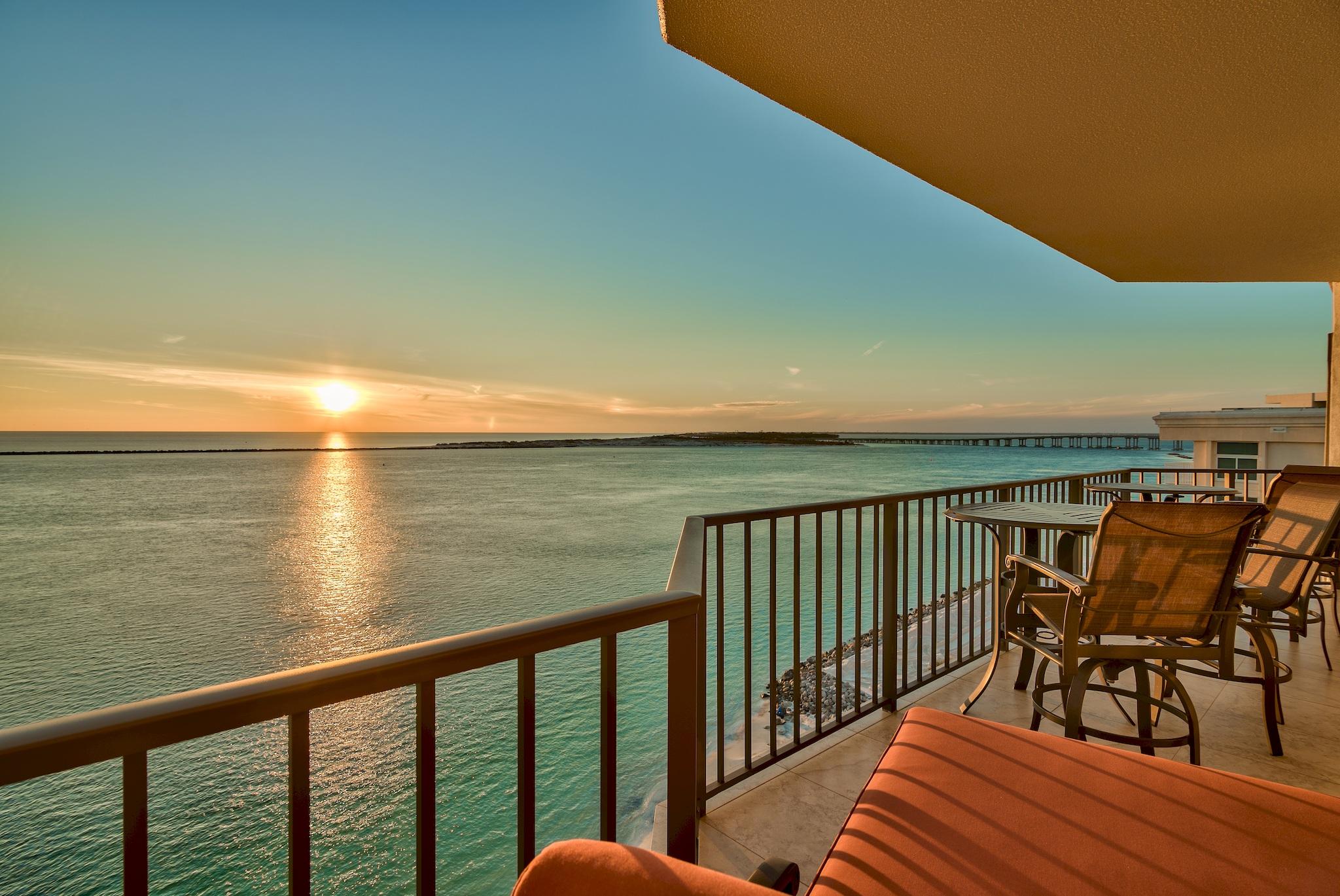 Unit 723 at Waterview Towers Yacht Club is exquisitely perched on the 7th floor, boasting a seldom seen, architectural gem; a nearly 360-degree surrounding view of Destin's most prominent waterways; the Gulf of Mexico, the East Pass and the Destin Harbor. The Gulf of Mexico with its energetic emerald green waters, the East Pass with its rich ecosystem of sea life and lastly, the Destin Harbor, home to the largest fleet of fishing boats in North America, each waterway contributing its own distinctive characteristics, creating a view that is both compelling and exclusive.
Having been masterfully renovated in 2013, unit 723 upgraded its design, now offering a spacious, open floor plan with dual living areas. Both living areas showcase grand windows with motorized window treatments and lead to an awe-inspiring balcony that spans nearly the length of the entire residences. The living areas are positioned opposite of each other, ensuring optimal access to your preferred scenery. The first area faces the Destin Harbor, the ideal position to watch the fleet of ships as they return home. This living space also features a fireplace along with an office space.  

The state-of-the-art kitchen, suitable for a chef features an iconic Wolf gas range that comes equipped with a center flattop. Other kitchen noteworthy features include custom cabinetry with soft closing hinges, a built in Sub-Zero refrigerator with a sectional freezer and coordinated paneling that flows seamlessly with the kitchen cabinetry, sleek granite counter tops, a stylish back-splash, and an impressive 4-seater kitchen bar that's topped off with chic bar lighting. 

Capitalizing on the scenery, grand windows continue into the master suite, providing a sensational panoramic view of the Gulf of Mexico as well as the East Pass. The master suite also comes equipped with recessed reading lights just above the bed, sophisticated crown molding, and finished with a private door leading to the balcony. The master bath showcases an elegant elevated freestanding tub that also offers relaxing water views. Designed for luxury and convenience, the master bath also features a glass shower with floor to ceiling tile, a separate make-up vanity and a closet with built in shelving.  

Every Bedroom, including the bunk room offers a unique view of one of the three waterways. Unit 723 also contains a generously sized laundry & utility room with sink, a wet bar and of course, private access to Waterview Tower's amenities, including a private beach, a resort-style pool, hot tub, tennis courts, fitness center and gathering rooms. Additionally, the residence includes a deeded oversized garage for your beloved cars and toys, and an additional covered parking spot.

Experience some of life's greatest moments with blood orange sunsets, firework shows, and grilling on your balcony on a relaxed afternoon. Whether you're entertaining guests, exploring the shops and restaurants of HarborWalk Village or simply watching the marina traffic go by at night, indulge in all that this stunning condominium has to offer- and begin living your best life among the water!