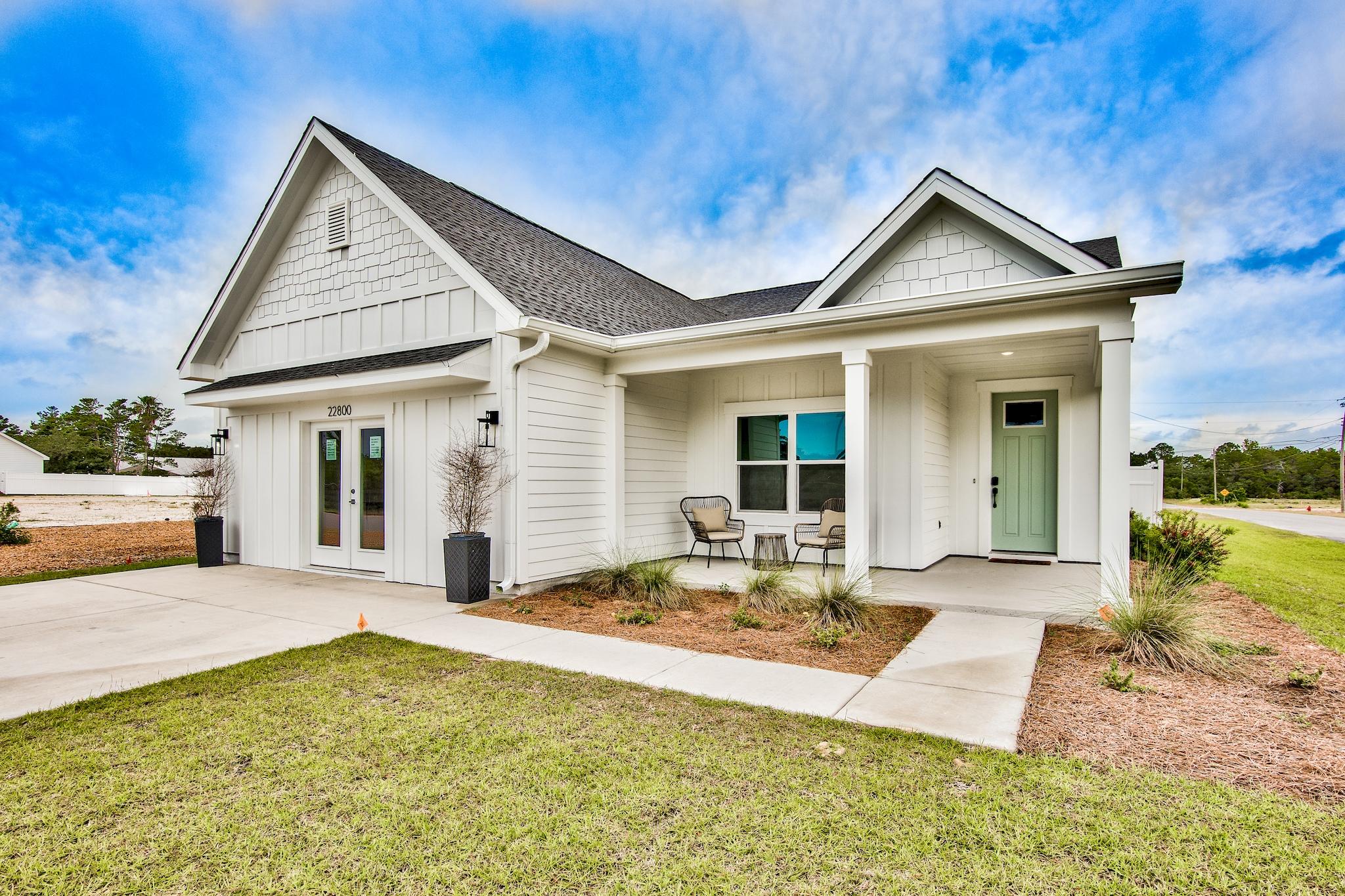 Enjoy the Inlet Beach lifestyle for a fraction of the price! The Preserve at Lake Powell is a coastal community located on the west end of Panama City Beach. We have 40 new lot/home packages to choose from and 4 floor plans. This premier development is only a short drive to the largest public beach access in Walton County, the public boat launch at Lake Powell Park, 30 Avenue for shopping & entertainment, Camp Helen State Park, and Rosemary or Alys Beach. Coastal style homes featuring quality materials, bold features, and versatile design are the centerpiece of this serene residential retreat. This Grouper floor plan features 4 bedrooms (option for a fourth bedroom & full bath in lieu of a study & half bath), 3 baths, 2,015 sq ft, 2-car garage, and 2 covered porches. *Photos are of the model home (Grouper floor plan) and are being shown to give a representation of the finishes used within the community.* Standard features include scratch resistant laminate hardwood flooring, cabinets with soft close doors & drawers, granite countertops (can upgrade to Quartz), and more. Upon entry you are welcomed into the foyer which leads directly to the kitchen and open living & dining areas. Several windows bring in lots of natural light giving the space a great ambiance.

The kitchen features a large center island with breakfast bar, stainless steel appliances, cabinets with soft close doors & drawers, granite countertops & backsplash, and a separate pantry. There is an option to upgrade to the gourmet kitchen.

The spacious master suite features a luxurious en-suite master bath with double vanities, walk-in tile shower, oversized walk-in-closet, and a separate water closet. In lieu of a study, you can opt for a fourth bedroom located just off the foyer at the front of the home.

This is your opportunity to own a brand new coastal home located in the heart of what makes the Emerald Coast famous. The Preserve at Lake Powell is ideally located with quick and easy access to outdoor activities such as biking, hiking, kayaking, paddle boarding, boating, and fun beach days. There are currently homes under construction and several available lots. Choose your lot and the features/options of your Grouper floor plan today! Full packages are available upon request. We look forward to helping you find an amazing property with a million dollar lifestyle at a fraction of the price!

**Pricing is subject to change based on additional upgrades being added during the construction process.**