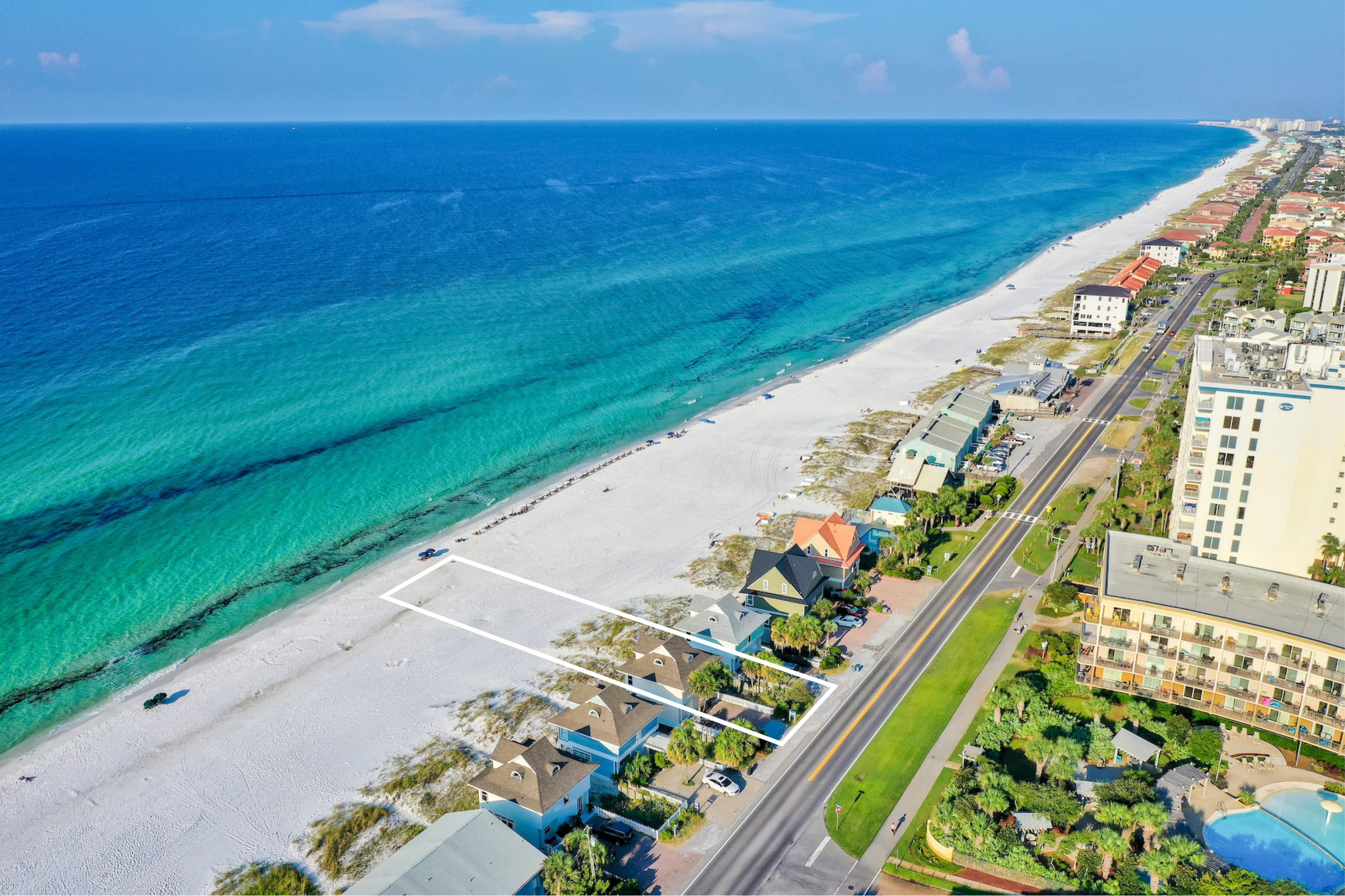 Unparalleled gulf views abound from this prominently located beachfront escape primely positioned on fifty linear feet of premium white sand perfectly located in South Walton County along Scenic Highway 98. A pristine retreat, this well maintained home would be the perfect secondary residence or short term rental offering an abundance of space with an idealistic open floor plan taking full advantage of the unobstructed vistas over the Gulf of Mexico. Gross annual rental projections exceed $140,000+. Recently remodeled and finely appointed, this three bedroom home offers an expansive living room with 180 degree views over emerald green waters enjoyed through floor to ceiling glass windows with notable features including hardwood flooring, ample parking, newly installed AC units as well as composite decking for longevity and durability. The first floor provides an open layout anchored by a chef's kitchen complete with floating shelves, granite countertops, stainless appliances and ample cabinet space. The spacious living room offers a cozy fireplace and direct access to the rear deck which takes full advantage of the expansive views and offers plenty of room for outdoor dining and lounge chairs as well as an outdoor shower.  The second floor features two gulf front king suites each complete with a full ensuite bathroom offering newly updated tile & hardware as well as dual vanities for optimal comfort. The third floor is occupied by an over sized loft style bedroom with excellent views of the gulf and a large ensuite bathroom. This exceptional location offers optimal accessibility to world class restaurants, local entertainment, boutique & outlet mall shopping as well as premium golf courses and close proximity to the Legendary Marina for prime boating access.