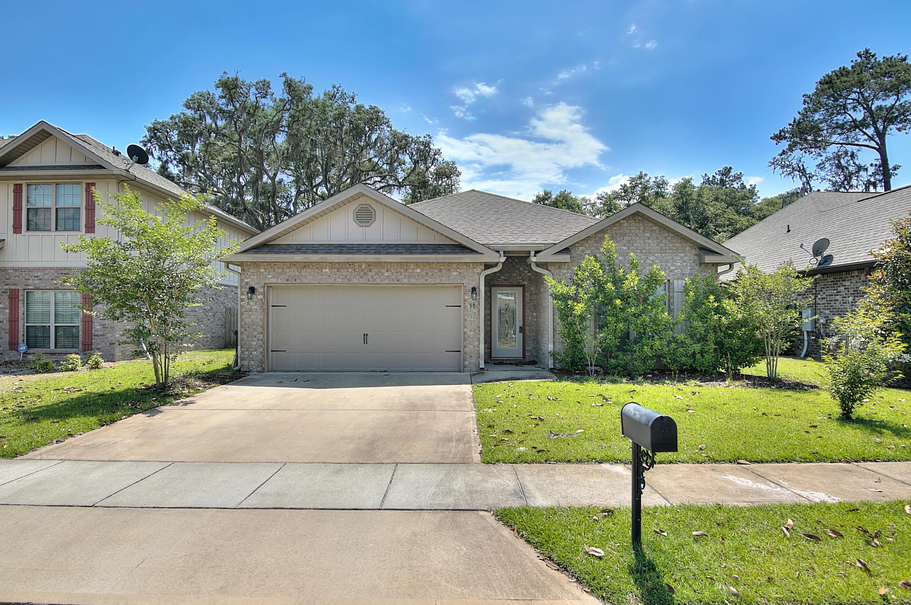 Point Washington location! Sweet brick home in a conveniately located neighborhood near Eden State Park and the Choctawhatchee Bay. This home has a split plan, master on one side of the home and 2 bedrooms, plus a bonus room large enough to be another bedroom, on the other side of the house. Stainless appliances in kitchen with pretty cabinets and granite counters.
Enjoy the spacious master bedroom with large bathroom with garden tub, separate shower and walk-in closet.
2 car garage.
This home is located very close to Bay Elementary and a short stroll to Eden State park and the boat ramp on Tucker Bayou leading to the Bay. Fantastic location in Pt. Washington!