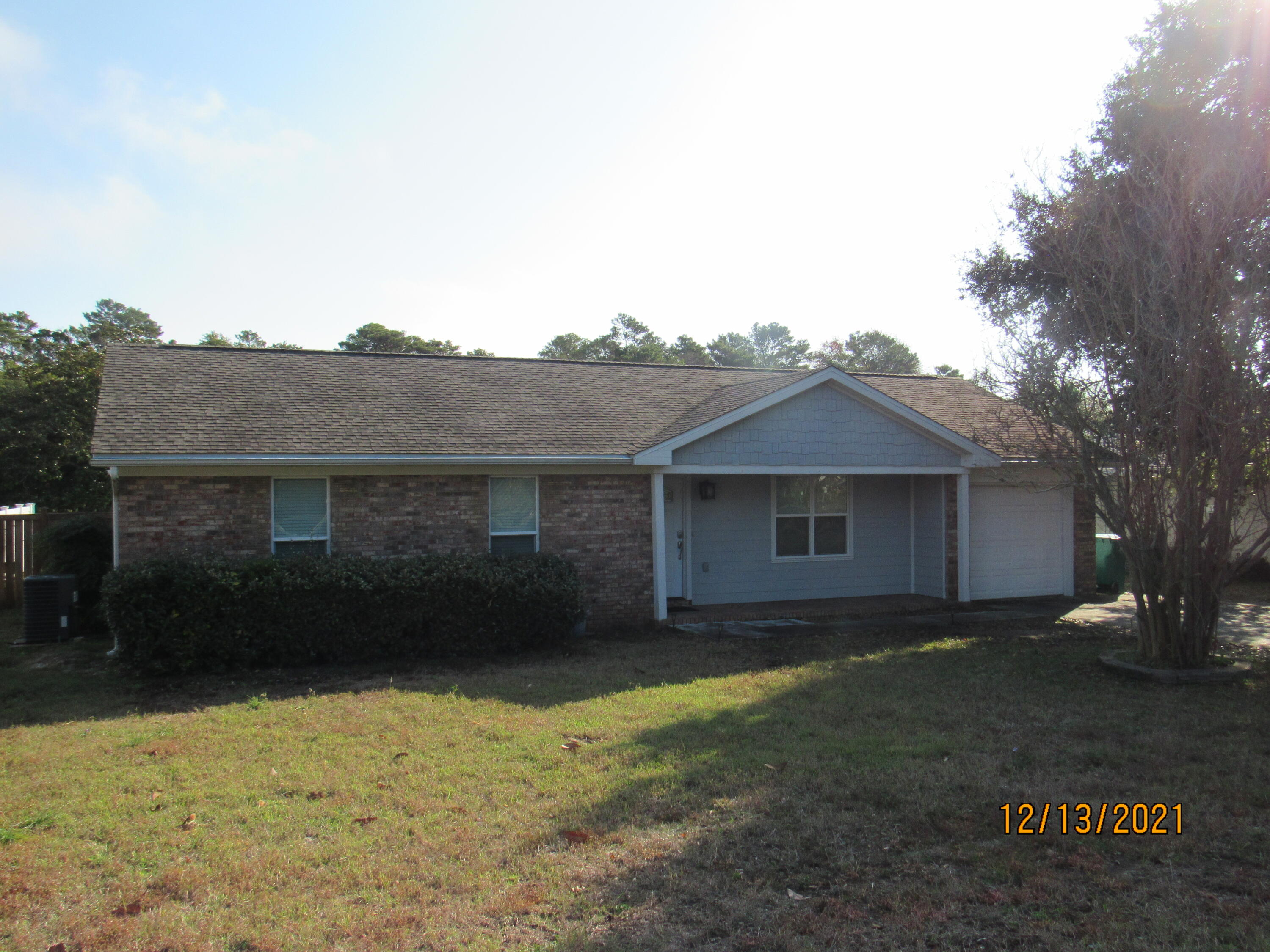 Super cute 3 bedroom, 2 bath brick home on a HUGE lot - if you love the harbor, this is the home for you! This house is renovated with a spacious living room, granite counter tops, shaker style cabinets, & stainless appliances in the kitchen, and a formal dining area. The primary suite is massive & features an en suite with dual vanities, granite counter tops, walk-in shower, and separate garden tub. This bedroom also has a sitting area, office area, and a huge walk-in closet with built-in shelving. The other two bedrooms are nicely sized and share a full guest bath. 1-car garage, enormous laundry room (washer/dryer included), gigantic, privacy-fenced back yard with deck and shed. No carpet, no popcorn ceilings. Owner may consider pets on a case-by-case basis with prior owner approval & a non-refundable pet fee. No smoking, including vapes.