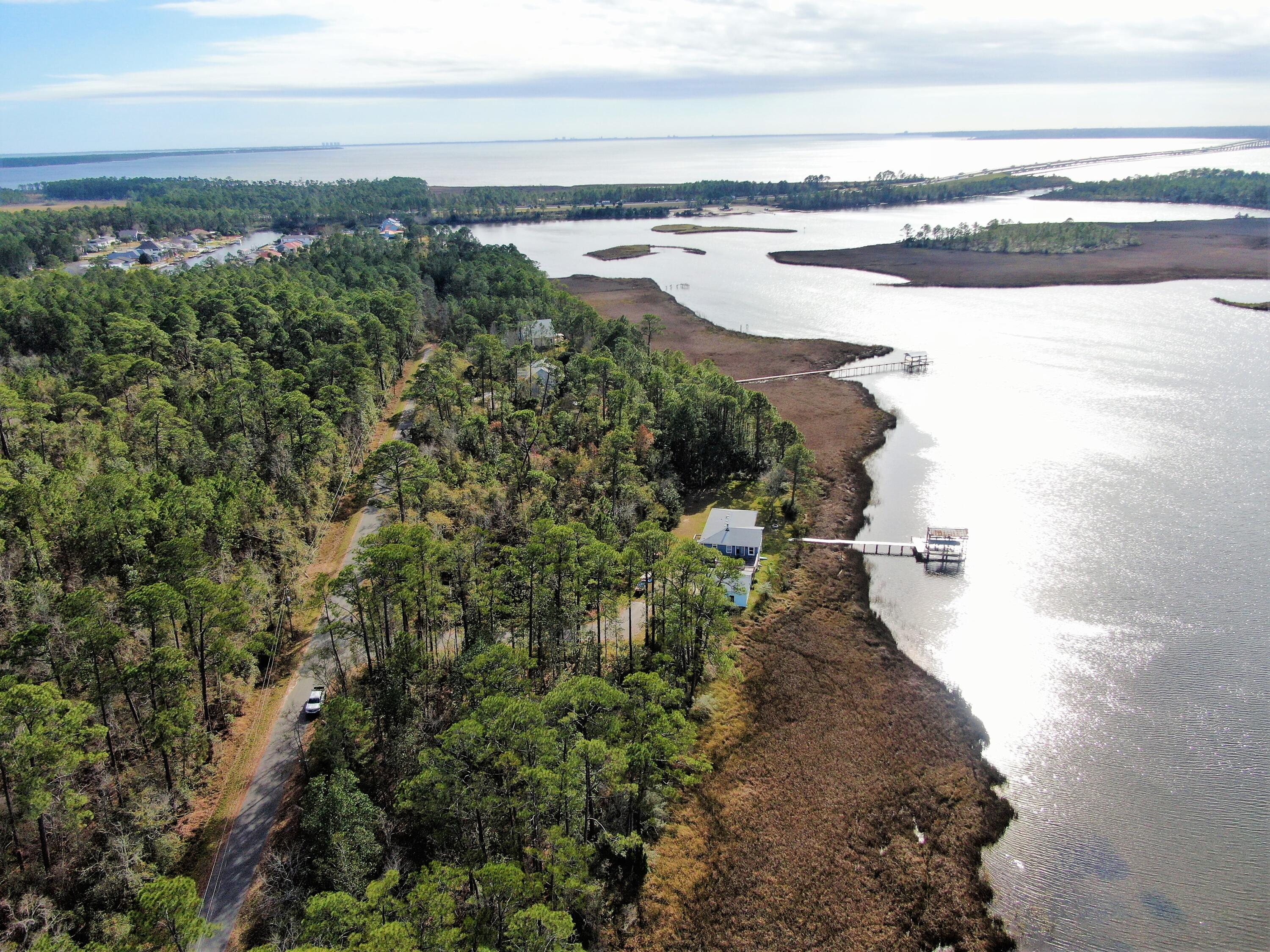 Another opportunity to own a water-front lot on Mulatto Bayou which lead into Escambia/Pensacola Bay . 
 
Two parcels sold as one totaling over 1.12 acre. Located in Avalon, FL. Avalon is an unincorporated community and census-designated place in Santa Rosa County, Florida less than 30 minutes to Pensacola Beach and 20 minutes to Pensacola Airport or Downtown.
 
The property is located a couple of minutes from exit 22 on I-10. It is on a paved road, all the utilities are available and ready to be tapped. 
 
This is a fast paced growing area and the possibilities are endless. Enjoy great fishing, boating and beautiful sunsets. 
 
Claim your perfect retirement destination or your vacation home spot today!
 
Reach out for more information.