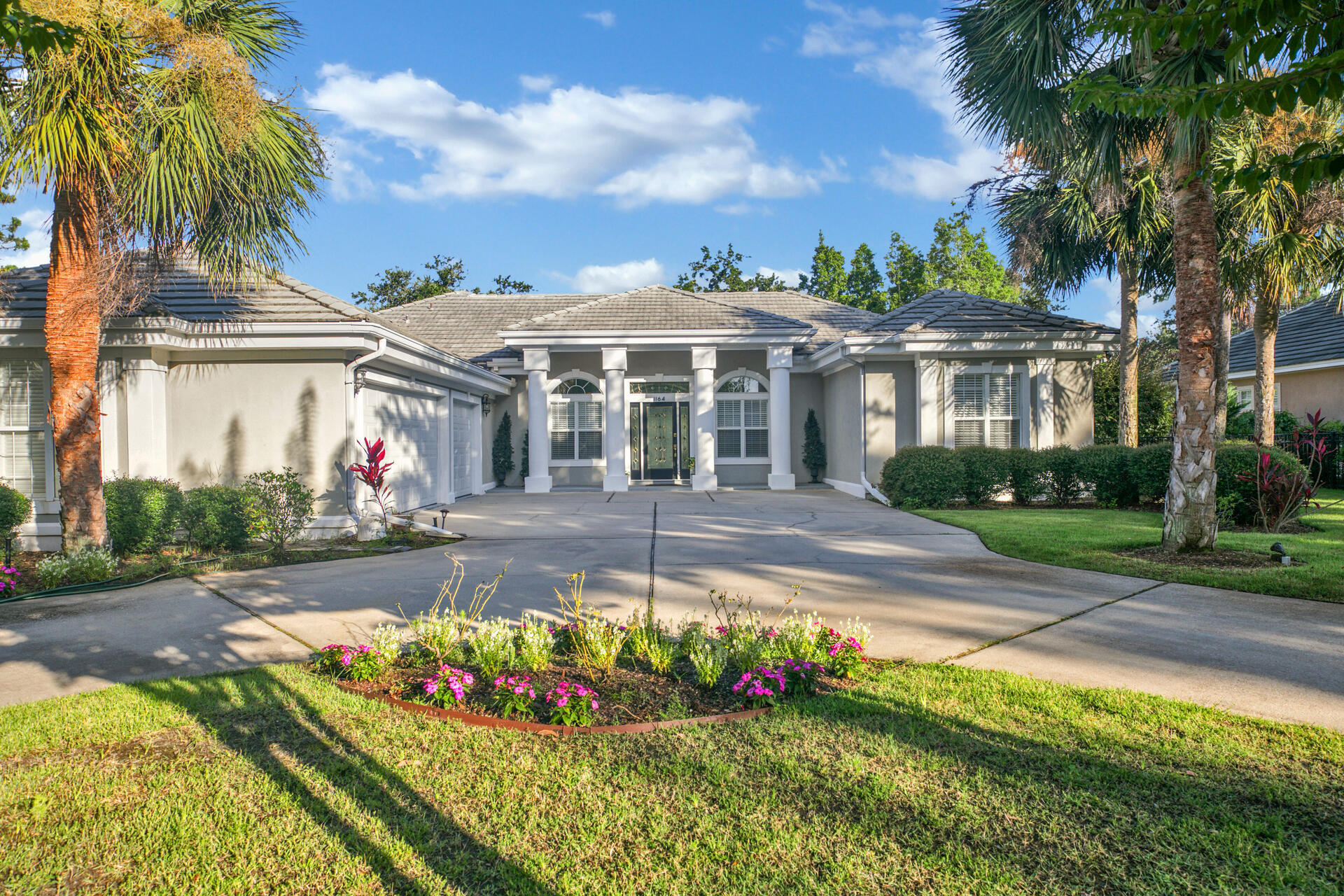 This beautiful newly renovated 3 bedroom 3 bathroom home is ready for it's new owner. This home is sure to impress with it's open concept floor plan and rare 3 car garage inside the resort of Sandestin! The garage comes equipped with an outlet for charging electric cars.  This home sits on a very large .31 acre lot that is located in the X flood zone. New hurricane rated sliding doors were installed leading out to the pool area. The heated pool and spa area is completely screened in for your enjoyment and features an outdoor summer kitchen. With a chef's kitchen featuring quartz countertops and a very large island this home is entertainer's dream. This home is located in the neighborhood of Troon which does not allow short term rentals.