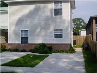 Spacious 2 story, end unit townhome! Separate dining, living and kitchen areas. Both bedrooms are spacious and lots of natural light throughout. Tile in wet areas. Minutes from the beach and Miracle Strip Pkwy. Like new so don't miss out! Washer & Dryer included. Yard service included as well. CAT only allowed with non-ref pet fee.