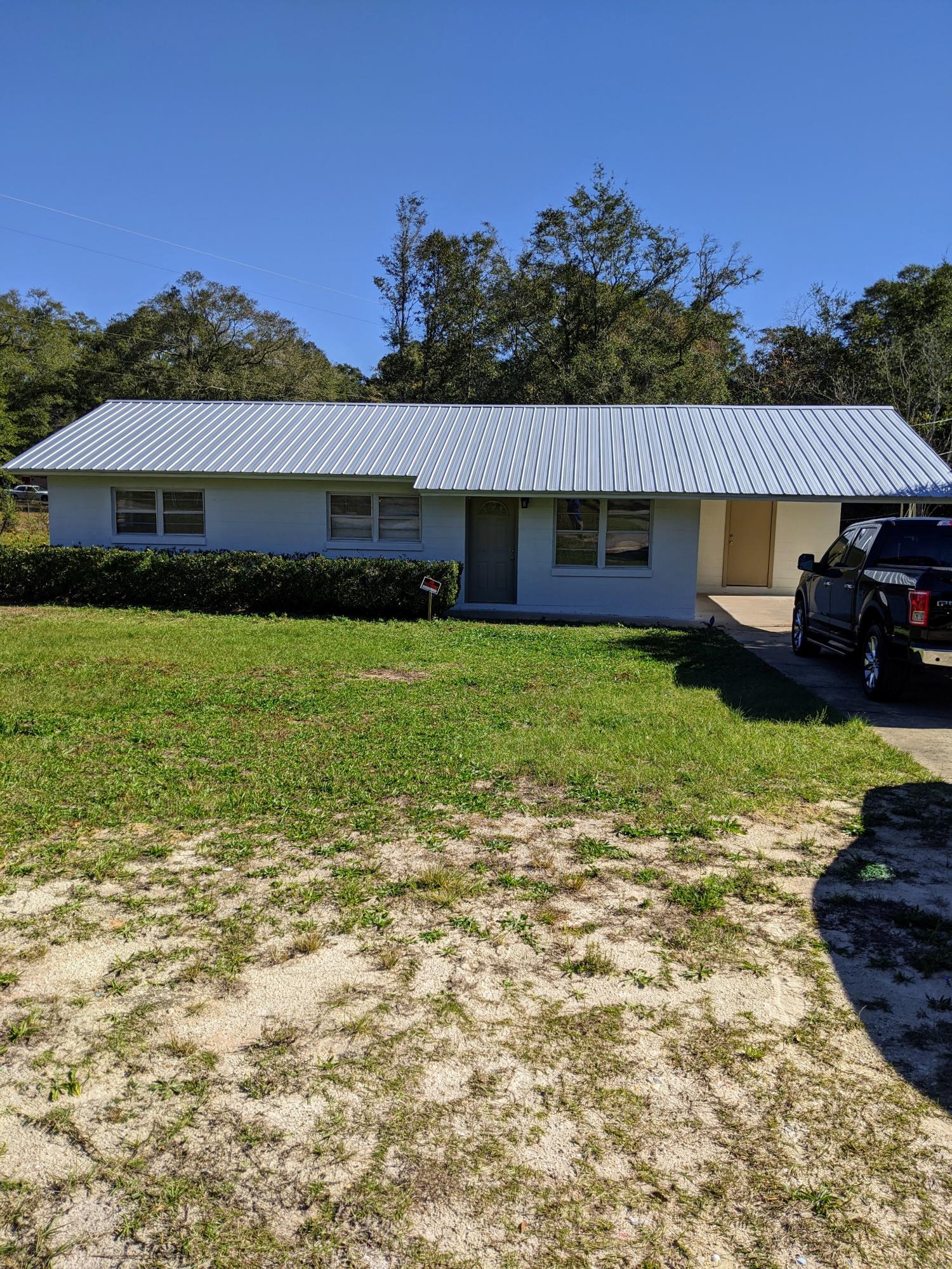 Great starter home located close to schools, parks, water recreation and much more. Solid home is freshly painted inside and outside. Metal roof was put on last year.  Large utility room off carport. Perfect sized yard for outdoor family fun including a concrete pad with basketball hoop. 3 good sized bedroom and 1 bathroom. Owner will consider financing.