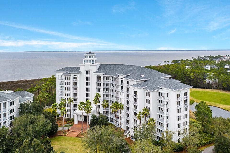 Exceptionally well-maintained and rental-ready, this fully furnished 1-bedroom condo in Elation offers spectacular bay and golf course views from the 5th floor in the heart of Sandestin Golf and Beach Resort. Designed for effortless ownership, the residence includes a convenient storage cage for all your beach gear and one assigned underground garage parking space.

Located in the Village of Baytowne Wharf, Elation places you just steps from premier dining, shopping, entertainment, and year-round events. Owners also enjoy exclusive access to the private Solstice Club, featuring a bayside pool, hot tub, fitness center, and outdoor gathering spaces available only to Sandestin property owners.

Whether you're searching for a vacation retreat, investment property, or both, this turnkey condo is ready to enjoy from day one and offers excellent short-term rental potential in one of the resort's most desirable locations. Sandestin Golf and Beach Resort features more than seven miles of beaches and pristine bay front, four championship golf courses, 15 world-class tennis courts, a 226-slip marina, a fitness center, spa and celebrity chef dining. Shop, dine and play at the charming pedestrian village, The Village of Baytowne Wharf and more. Inside the gates of the resort, residents enjoy a balanced lifestyle of high-class living, spanning the 2,400 acres from the beach to the bay. Everything within the gates of the resort is accessible by golf cart or bicycle. The entire resort is interconnected by miles of pedestrian, bike and golf cart paths that weave through groves of live oaks, meandering past natural lagoons, fountains, man-made lakes, and meticulously landscaped fairways.
