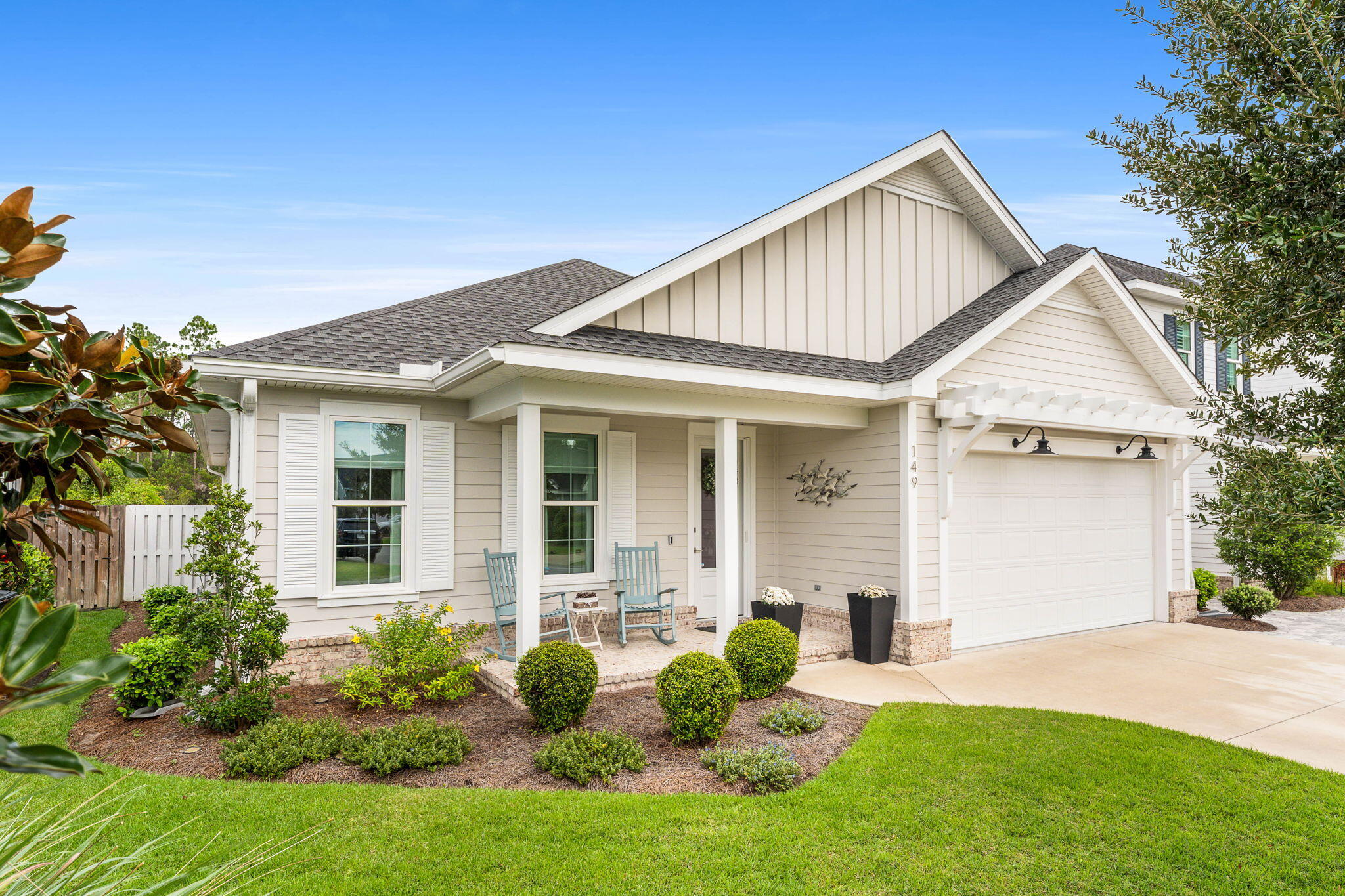 Designed for both comfort and sophistication, this exceptional one-story residence offers an enhanced Bella floorplan with 3 bedrooms, 2 bathrooms, and nearly 1,800 square feet of thoughtfully curated living space.

The kitchen serves as the centerpiece of the home, combining style and functionality with premium Bosch appliances, convenient refrigerator drawers, an InstaHot water system, and a generously sized island that provides ample workspace and storage. Whether preparing a casual meal or entertaining friends and family, this space is designed to accommodate every occasion.

Adjacent to the kitchen, the spacious living area creates a welcoming atmosphere with custom built-in shelving and a gas fireplace that adds warmth and character.

Attention to detail extends throughout the home, including professionally designed California Closets in every bedroom, offering customized storage solutions that maximize organization and everyday convenience.

This residence seamlessly blends upscale finishes, practical design, and effortless living in a floorplan that feels both elegant and inviting. 
*Putting green in backyard for golf enthusiasts.