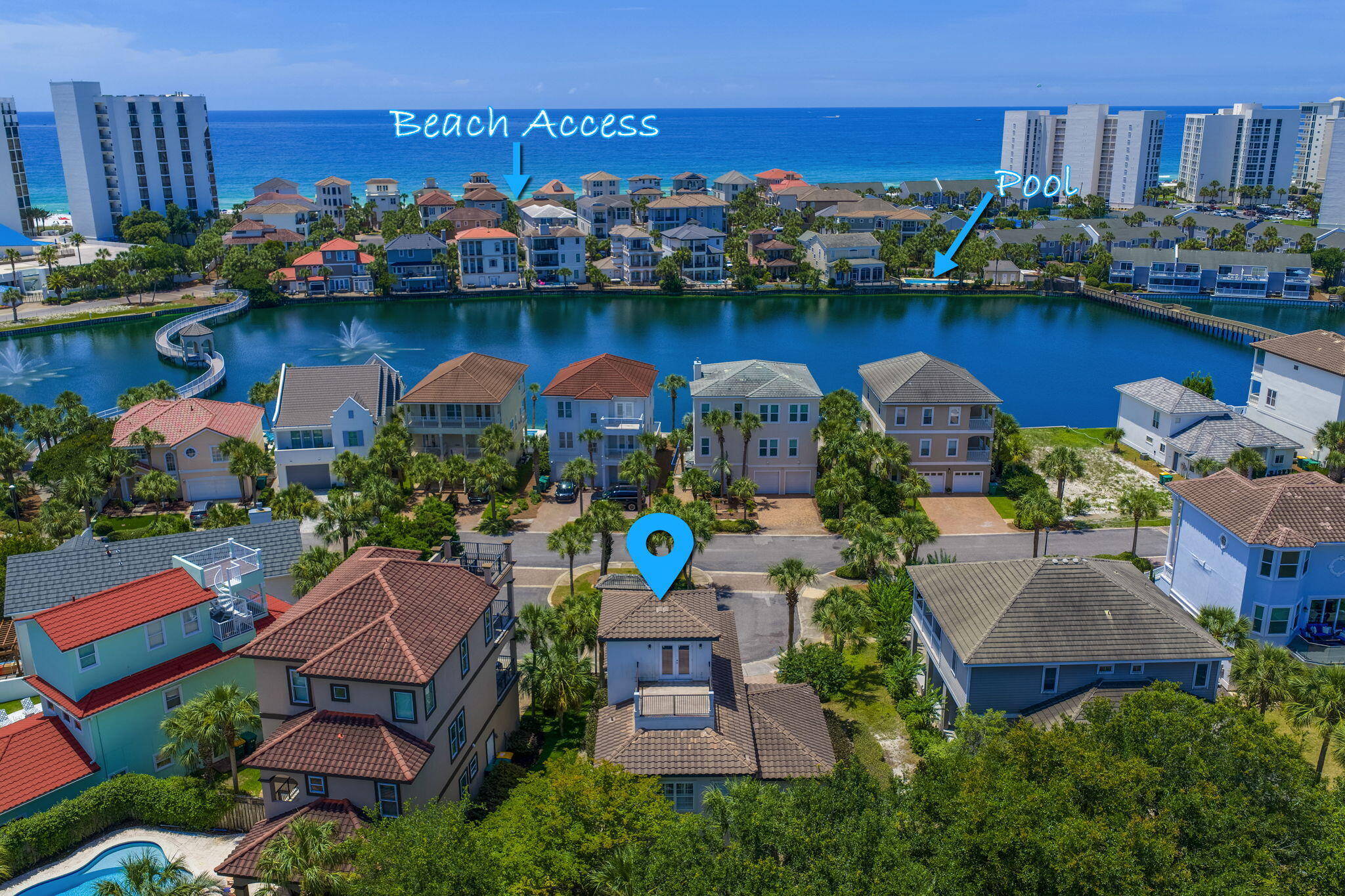 Coastal Mediterranean Villa Style home located within a Gated, Beach Front Community in Destin. The wood tile floors, exposed beams and stone counter tops add warmth and sophistication to the living, kitchen and bathroom areas. Inspired to entertain the living area is open with a lot of tall windows providing natural light. The large 3rd floor balcony offers spectacular views toward the lake and beach. The spacious master suite features a private balcony and is nicely updated with Granite and travertine stone in the master bath. The Dunes of Destin residents enjoy 600 ft. of deeded beachfront, a community pool, fresh water lake with fountains and walkovers. Ideal location and lifestyle for full time living or a vacation home!