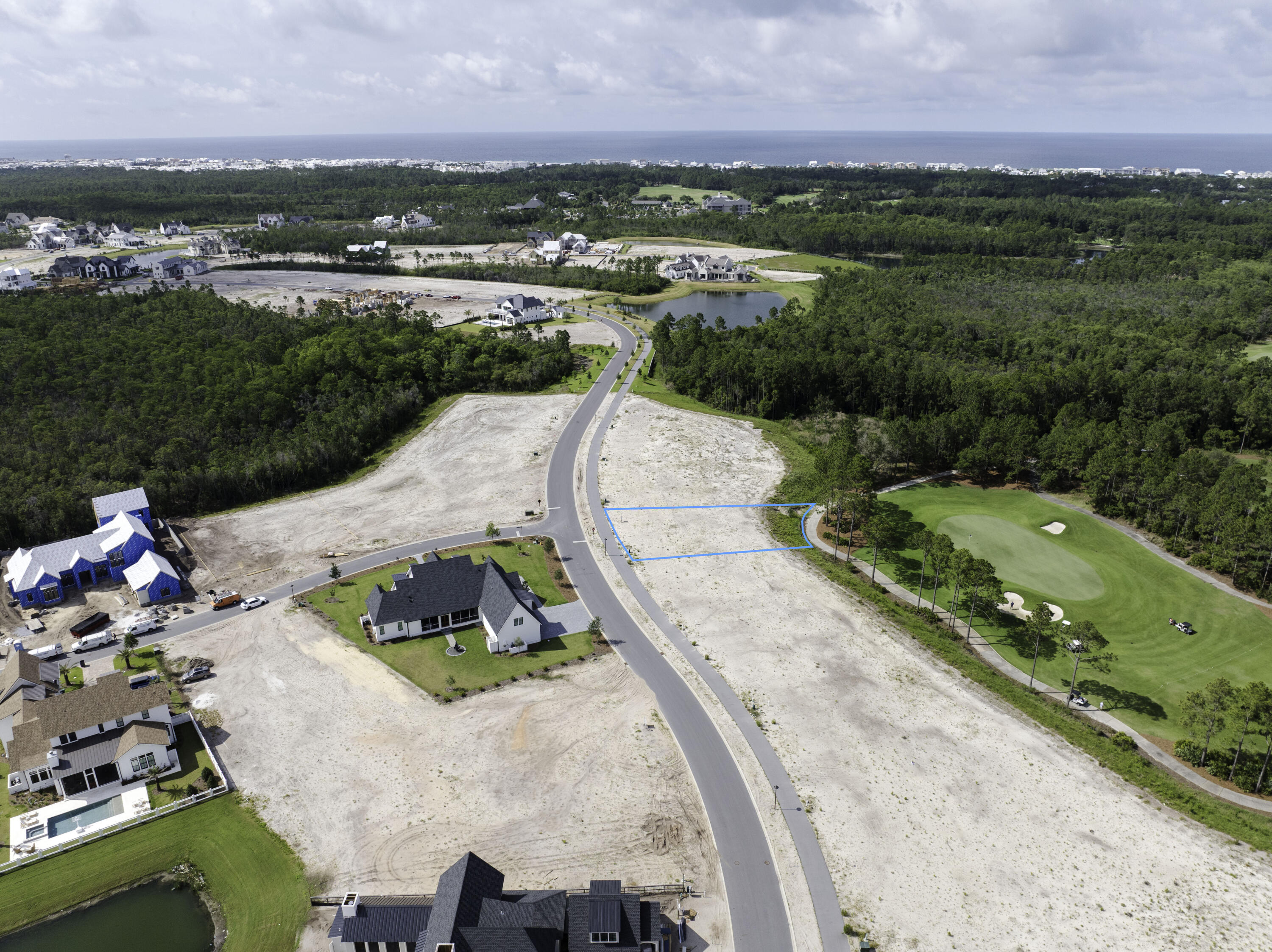 Discover an unparalleled opportunity to build your dream home in the exclusive, gated community of Camp Creek. Lot 79 Windsong Dr. offers a prime location right on the 15th green of the renowned Camp Creek Golf Course, delivering stunning fairway views and a serene natural backdrop. This lot comes with a Watersound membership and also can come with fully approved/ready to break ground architectural plans. A beautiful 4,700sq.ft. custom home designed by Pure Architects. 
Camp Creek offers world-class amenities, privacy, and access to scenic trails, the beach, and the new Watersound Club facilities. This is a rare chance to secure one of the best lot locations.