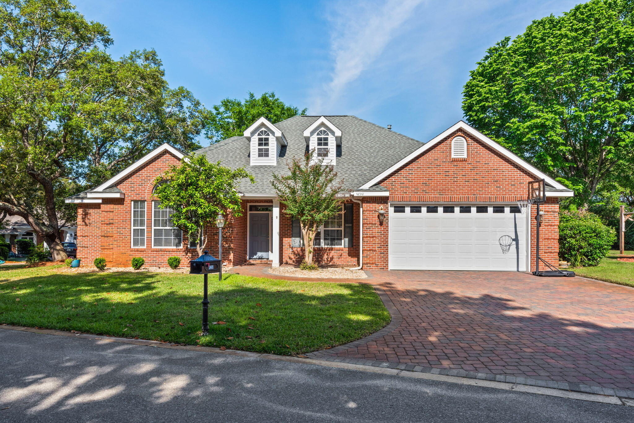 Welcome to this beautifully appointed 3-bedroom, 2-bath single story home located in the prestigious gated community of Magnolia Plantation. Originally a Parade of Homes award-winning property, this residence blends timeless design with modern comfort. Step inside to discover soaring 10-foot ceilings and an open, thoughtfully designed split floor plan that offers both functionality and privacy. The spacious primary suite is tucked away on one side of the home, creating a private retreat, while two additional bedrooms are situated on the opposite side--ideal for family or guests. The heart of the home is the chef-inspired kitchen, featuring a gas range, generous center island, and ample space for entertaining or everyday living. The main living areas are finished in durable tile flooring, with carpet in two bedrooms for added comfort. The cozy family room features vaulted ceilings, a corner gas fireplace, and plenty of natural light!
Enjoy peaceful mornings and relaxing evenings on the screened lanai, perfect for coffee, tea, or simply unwinding in a serene setting.
Ideally located in a highly sought-after A-rated school district and just minutes from beautiful beaches, shopping, and dining, this home offers the perfect combination of convenience, comfort, and upscale living. Roof 2020, HVAC 2016, Water Heater 2026. Come see it today!