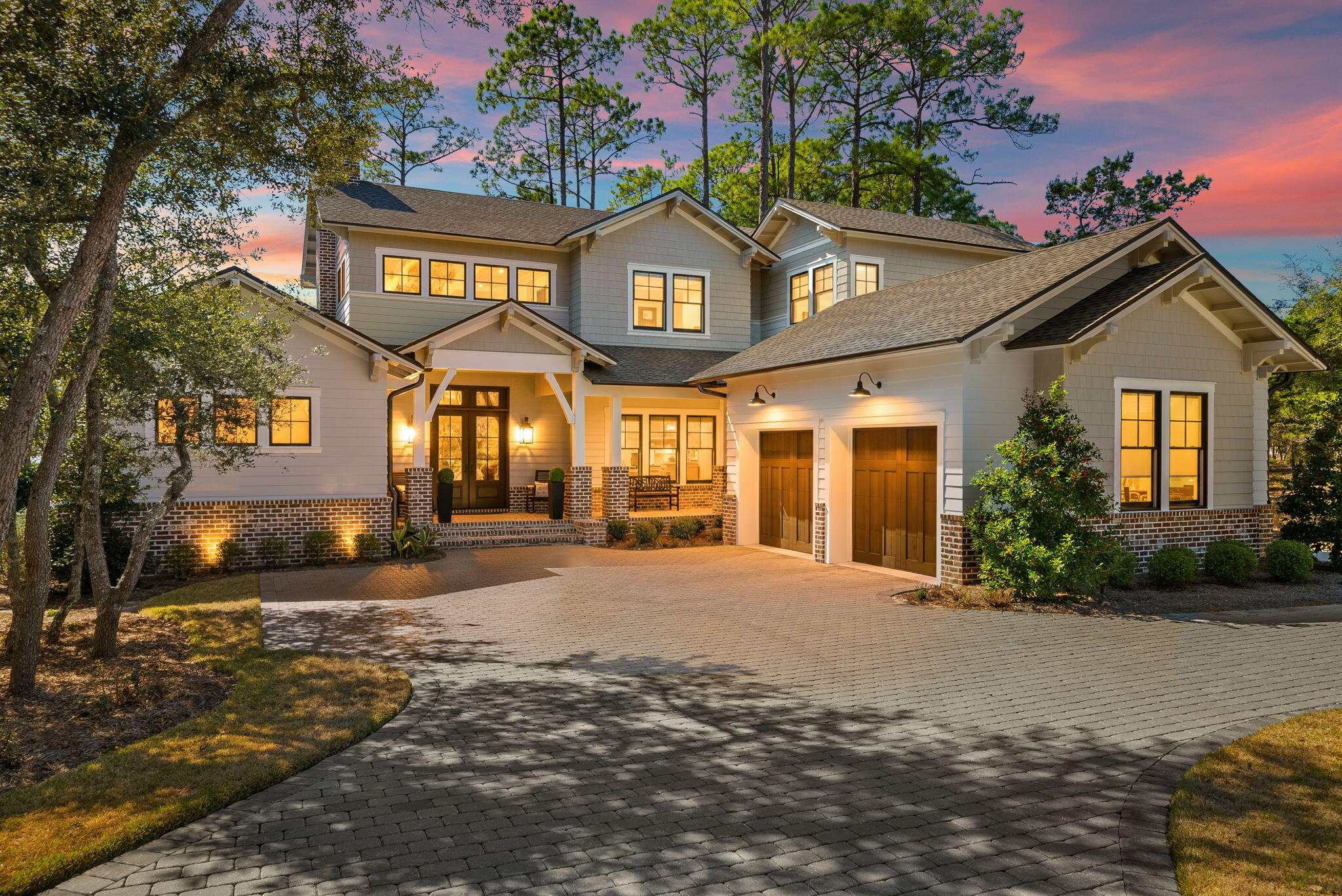Completed in 2024, this exceptional custom residence showcases the architectural vision of Michael Hunnicutt and the craftsmanship of Griffin Mitchell Builder, offering timeless design paired with modern coastal elegance.
Situated on a desirable corner lot in a prime location just moments from community amenities, this thoughtfully designed home features soaring ceilings, abundant natural light, wide plank hardwood flooring, and refined custom finishes throughout. The open-concept living space is anchored by a beautifully appointed kitchen and expansive great room, with a gas fireplace. 
The spacious primary suite offers a serene retreat with spa-inspired details, enjoy the wildlife and pond views from the comfort of your bedroom. 
While additional bedrooms provide comfort and privacy for guests. Every detail reflects quality construction and intentional design.
The exterior architecture blends classic elements with clean, modern lines, complemented by a welcoming front porch and professionally designed landscaping. A two-car garage plus a dedicated golf cart garage provides ample storage and convenience.
With an acceptable offer, highly desirable extras may be included, a coveted boat slip, golf cart, and furnishings, creating a truly turnkey opportunity.
An exceptional home in an unbeatable location, thoughtfully designed, beautifully built, and ready to enjoy.
Why spend the time to build new when this one is already done!