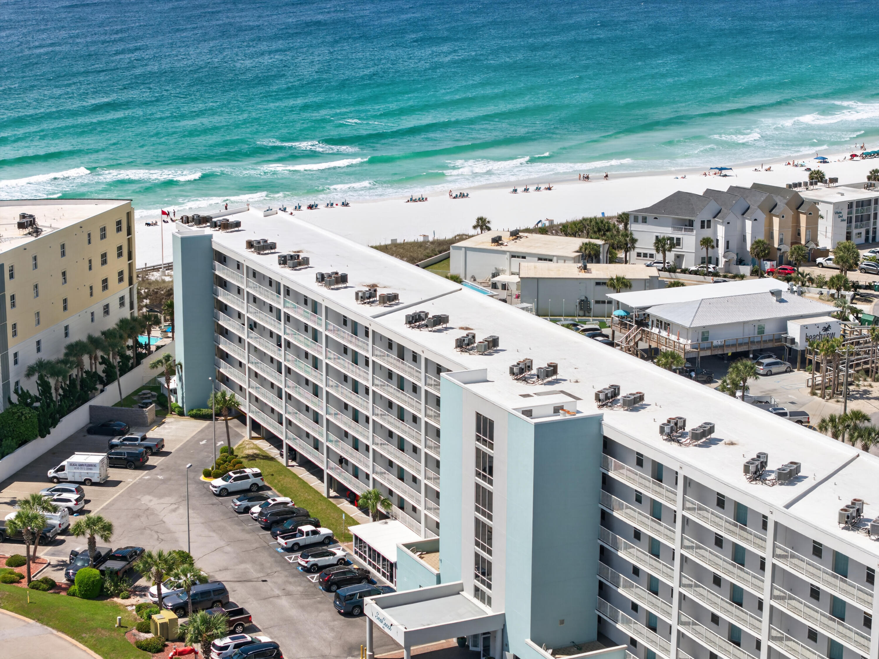 Discover your ideal coastal retreat on Okaloosa Island, where sugar-white sands and emerald waters set the stage for relaxed beachfront living. This beautifully maintained fifth-floor condo offers inviting Gulf views from your private balcony--perfect for enjoying morning coffee, coastal breezes, and unforgettable sunsets. The spacious primary bedroom features direct balcony access, creating a seamless indoor-outdoor experience that defines true beachside living.

Offered fully furnished, this turnkey unit is ready for immediate enjoyment or rental income. With strong short-term rental potential, this property is an excellent opportunity for investors or those seeking a personal vacation escape. The complex features a desirable indoor/outdoor pool that is heated during the winter months, allowing for year-round enjoyment, along with ample parking for both owners and guests.

Ideally positioned between Destin and Fort Walton Beach, Okaloosa Island offers a unique blend of tranquility and convenience. Residents and visitors enjoy easy access to waterfront dining, local entertainment, the fishing pier, boating adventures, paddle boarding, and dolphin cruises--all just moments away. Whether you're spending your days lounging on the beach, exploring the coast, or generating income through vacation rentals, this condo delivers the ultimate Emerald Coast lifestyle and investment opportunity.