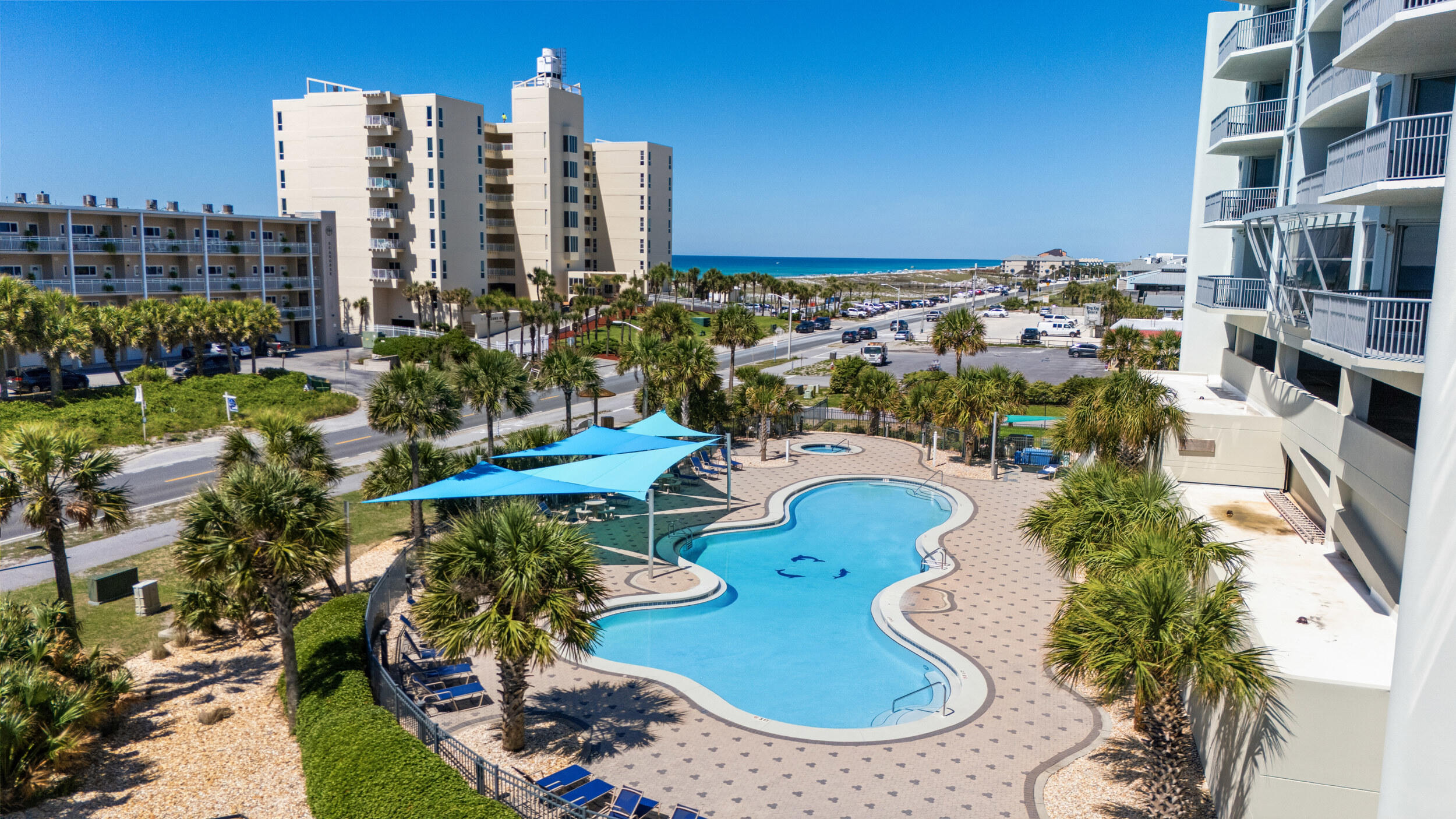 BRING AN OFFER! COME SEE IN PERSON! Investor opportunity with serious income potential on Pensacola Beach.

Welcome to Emerald Dolphin -- a beachfront 4-bedroom, 2-bath condo perched on the 12th floor with panoramic Gulf views, direct beach access, and an estimated $100K+ annual rental potential.
*ASK FOR THE CASH FLOW SHEET
!*
This is the kind of property vacation renters actively search for: stunning water views, spacious accommodations, resort-style amenities, and walkability to everything Pensacola Beach has to offer.

Inside, the condo offers an open-concept layout designed for entertaining and maximizing the views. Brand new luxury vinyl plank flooring installed in May 2024 gives the space a fresh, modern coastal feel, while the oversized balcony becomes an extension of the living space -- perfect for sunrise coffee, sunset cocktails, and unforgettable beachfront evenings. AMAZING RENTAL INVESTMENT OPTION! MOTIVATED SELLERS! 

The oversized Gulf-front balcony becomes an extension of the home itself, offering the perfect setting for morning coffee, sunset dinners, and panoramic waterfront views that guests will never forget. The spacious kitchen, dining, and living areas flow seamlessly together, creating an ideal setup for entertaining, holiday gatherings, and beach vacations.

Whether someone is looking for a high-performing short-term rental, a luxury second home, or a combination of both, Emerald Dolphin offers the kind of location, amenities, and rental appeal that continue to drive strong demand on Pensacola Beach. COME SEE IN PERSON!