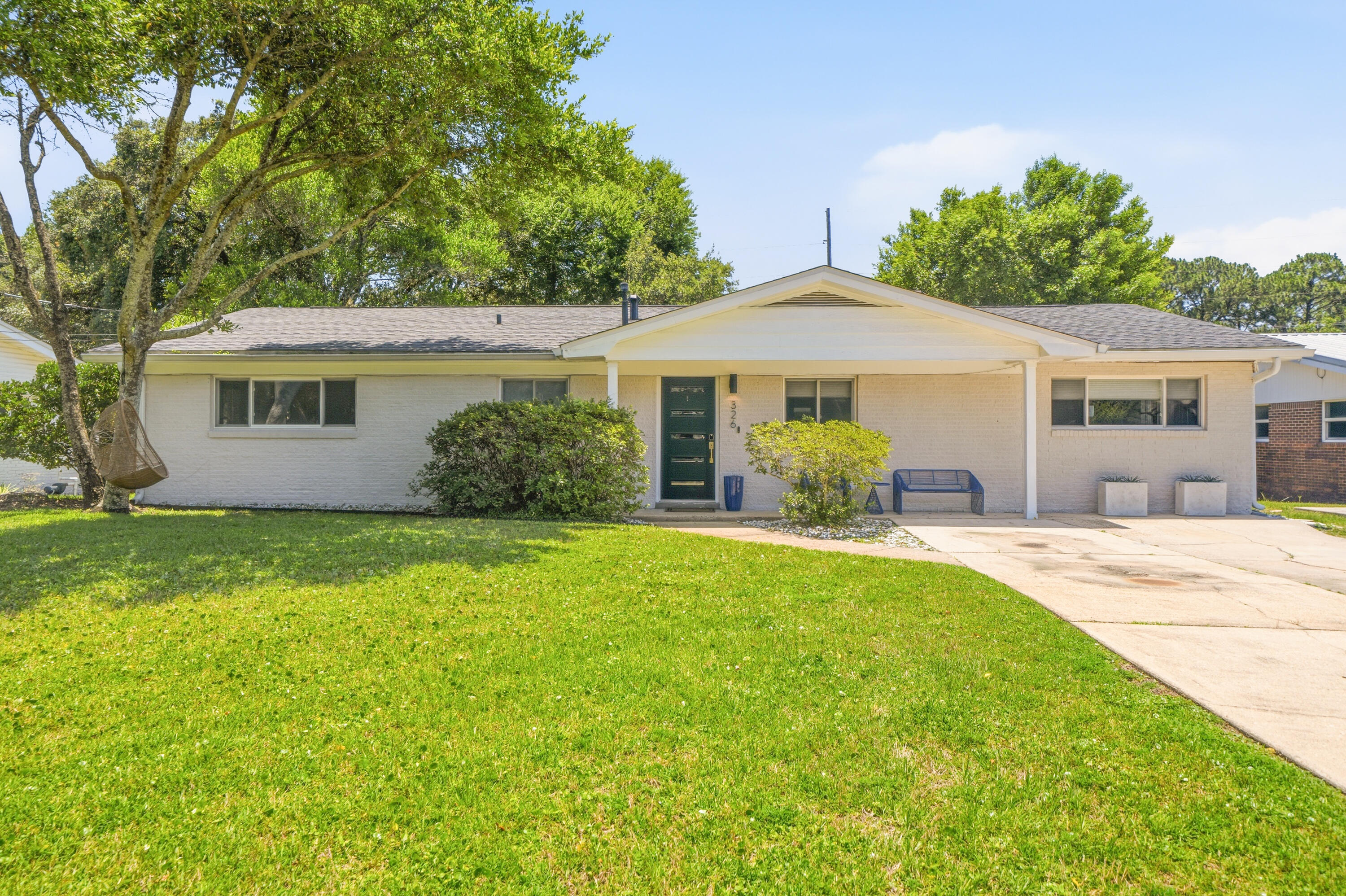 Welcome to this beautifully updated and stylish 4 bedroom, 2 bathroom home in the heart of Fort Walton Beach -- just minutes from the white sand beaches, Eglin AFB, and Hurlburt Field. Offering over 2,000 square feet of thoughtfully upgraded living space, this home blends comfort, functionality, and outdoor living perfectly.

Inside, you'll find a spacious and versatile floor plan featuring an additional flex room that can easily serve as a 4th bedroom, home office, gym, playroom, or media space. The home has been extensively updated with quality improvements including a renovated kitchen, upgraded copper wiring and electrical panel, newer HVAC system, modern exterior fiberglass doors, Bahama shutters, ceiling fans, and a roof installed in 2017.

Step outside to one of the home's standout features -- an incredible screened-in back porch perfect for relaxing, entertaining, or enjoying peaceful evenings year-round. The large backyard features thick, lush grass, plenty of room to play or entertain, and a newer Tuff Shed with durable lifetime decking for additional storage or workspace.

Located in a quiet, highly desirable neighborhood, this home offers the perfect balance of convenience and tranquility. Whether you're commuting to base, heading to the beach, or simply enjoying the Florida lifestyle at home, this property checks all the boxes.