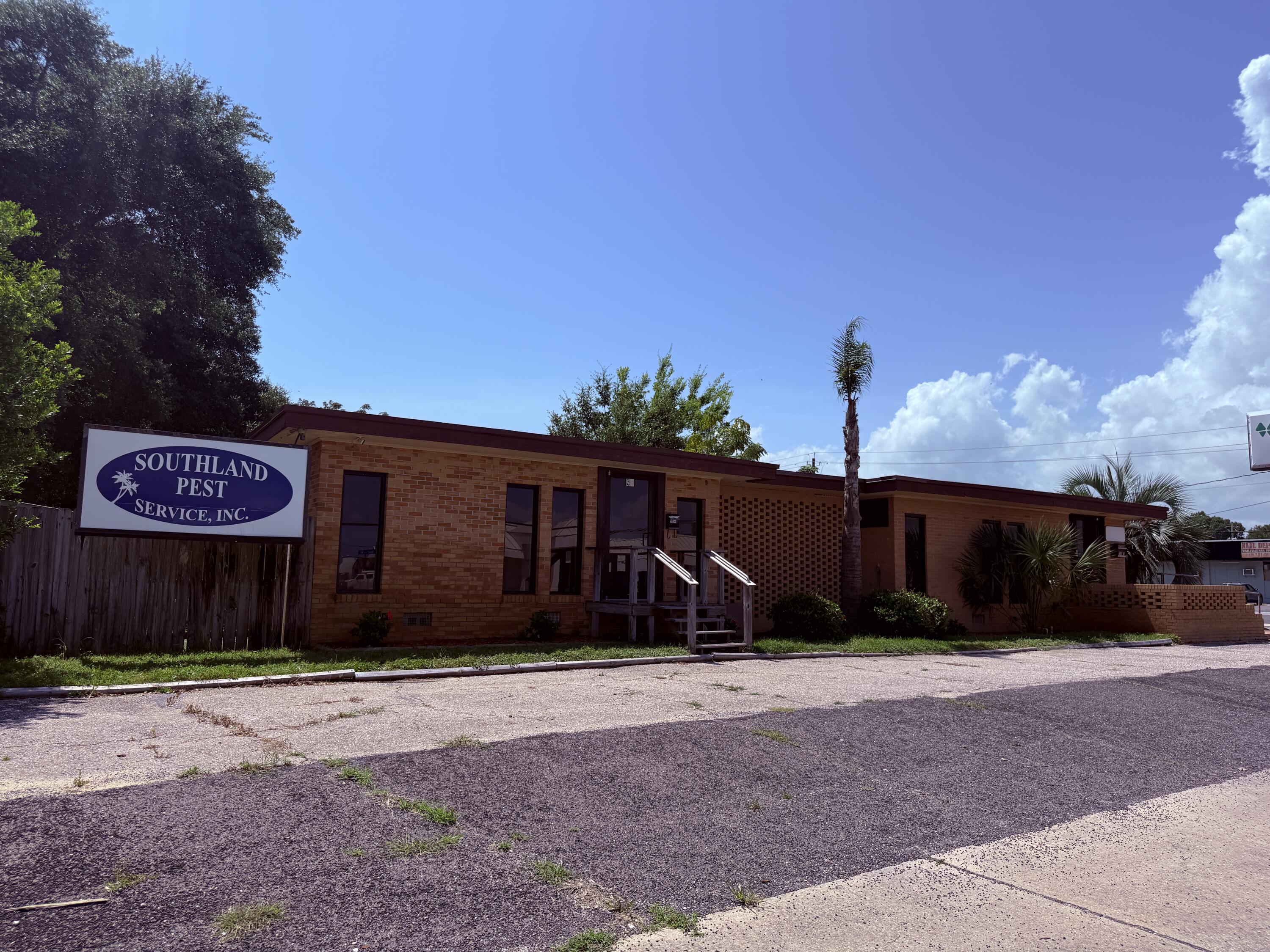 Prime Commercial Office Duplex with Outstanding Visibility on Beal Parkway! New Roof in 2021! Position your business for success in this highly visible 1,800 SF commercial property located along one of the area's busiest corridors. With exceptional traffic counts and prominent frontage, this property offers maximum exposure and easy accessibility--ideal for both established businesses and new ventures. Designed with flexibility in mind, the layout features two spacious reception areas, six private offices, a utility room, break room, and two restrooms, providing an efficient and professional workspace. Additional highlights include attached storage, a separate storage shed, and a large fenced yard--perfect for added functionality and security. Ample parking is available with direct access from Beal Parkway with a large parking area on the side fronting Holmes Boulevard for added convenience. This versatile duplex can be utilized as two separate units or easily converted into a single, larger space by opening the connecting door--making it suitable for a wide range of professional or retail uses. Don't miss this high-visibility opportunity--schedule your showing today!