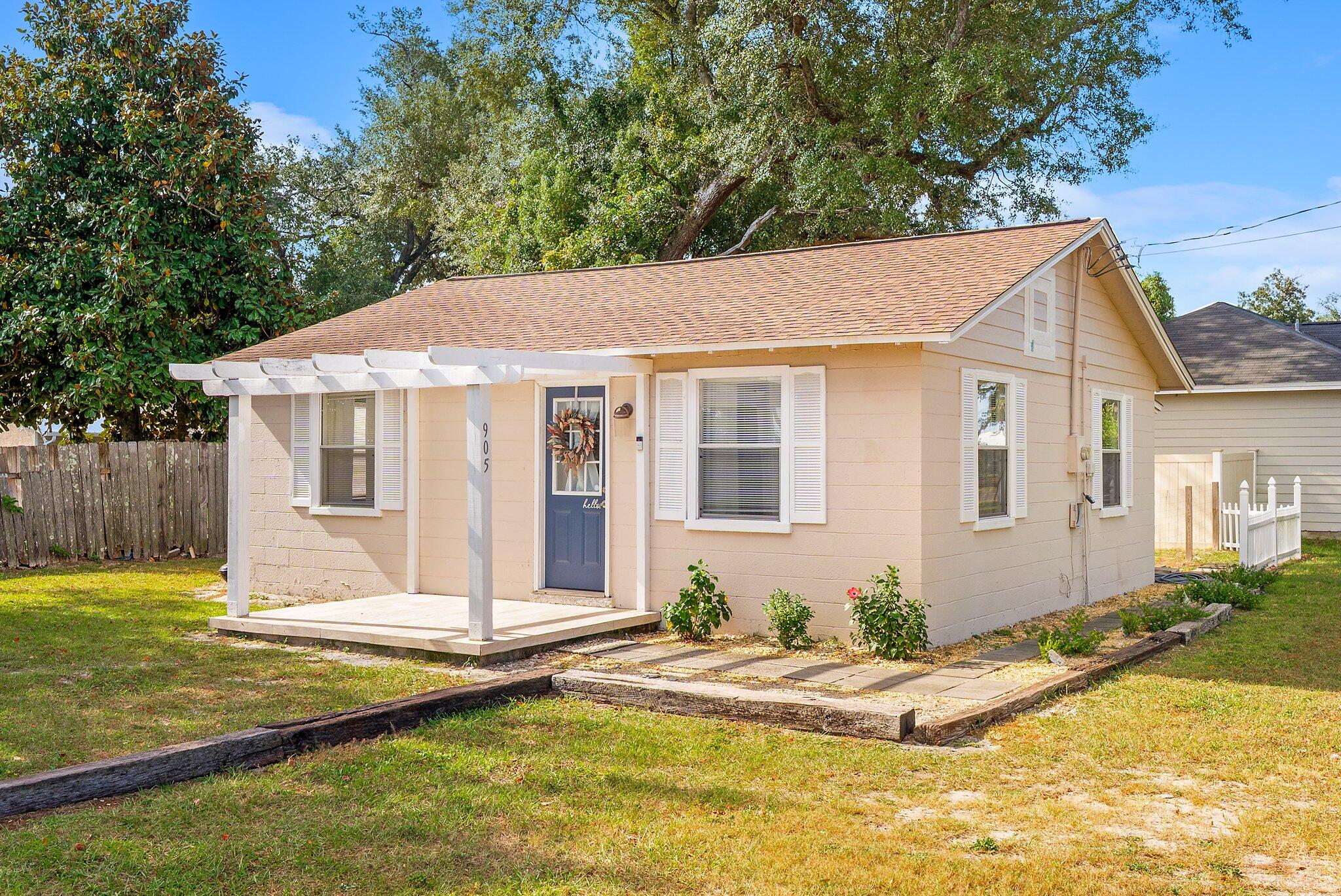 RECENTLY REMODELED, UPGRADES INCLUDE ALL NEW PAINT, ROOF WITH HURRICANE STRAPS. UPDATED LANDSCAPING. LOCATED ON A QUARTER ACRE (+/-) Quick easy walk to the water from this updated and charming brick home in Parker with a newer roof. A large open 1/4-acre lot allows plenty of parking for Boats, RV, guests, pets, Etc. Beautiful tile graces the front porch covered with a wood atrium. New tile flooring, lighting, fans, molding and paint throughout. A separate laundry room along very generous sized bedrooms all accompanied w/ tons of natural light. A wide-open living room attached to the kitchen makes any furniture layout desirable. New gravel in the drive, a wonderful neighborhood and 5 minutes to town or Tyndall Airforce base is 8 minutes away. Incredible opportunity for a vacation or long term. Also affordable first home or enjoy a second home getaway from a distance.