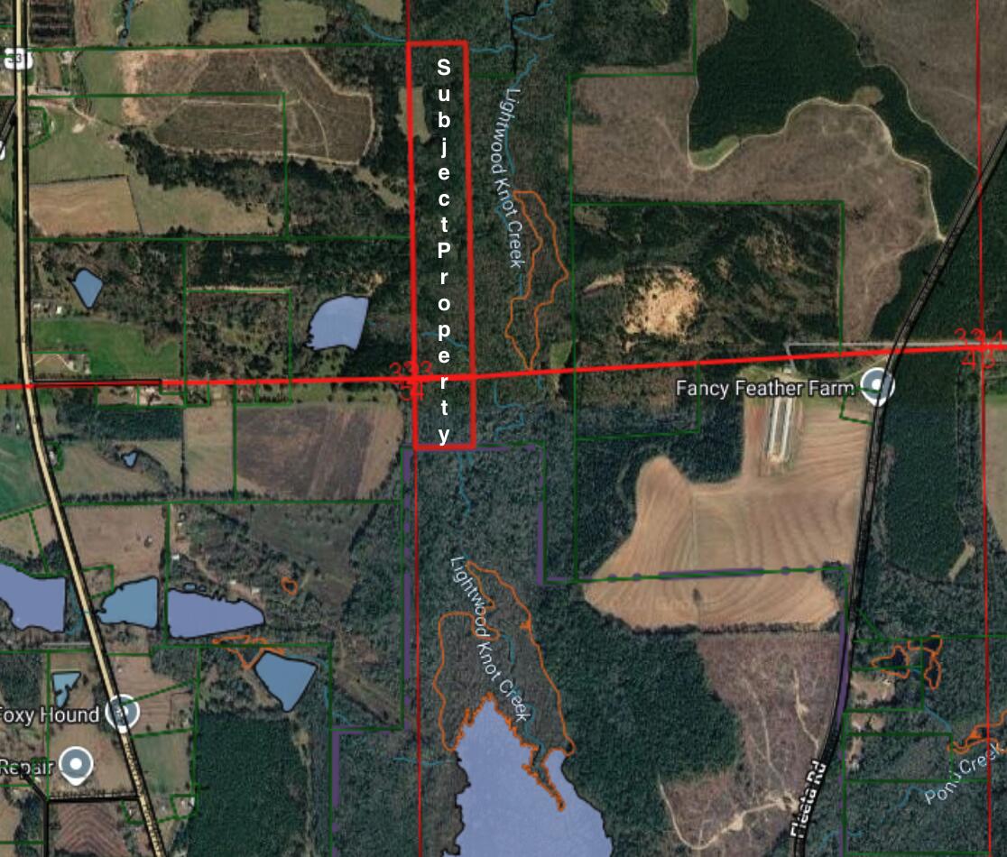 Next to Lake Frank Jackson state park! Lighternot Creek flows through!  Vacant land opportunity in Covington County, located outside the Opp city limits. This offering includes two contiguous parcels being sold together, totaling approximately 49+/- acres (one 40-acre tract and one 9-acre tract) per county records. The property is zoned Ag1 (Agricultural) with no structures or utilities on site. Please note: This property does not have direct physical road frontage. The parcels are situated west of Fleeta Road and border State of Alabama property to the south; however, the existence of a legal deeded easement, right-of-way, or physical access has not been verified by the seller or listing office. Property is being sold strictly as-is, where-is, with no access guaranteed. Map graphics and boundaries are approximate GIS overlays for reference only. Buyer and buyer's agent are solely responsible for verifying the exact acreage, property boundaries, and utility availability, and for researching the status of legal deeded access.Propoerty aquired yeas ago in Tax Deed.