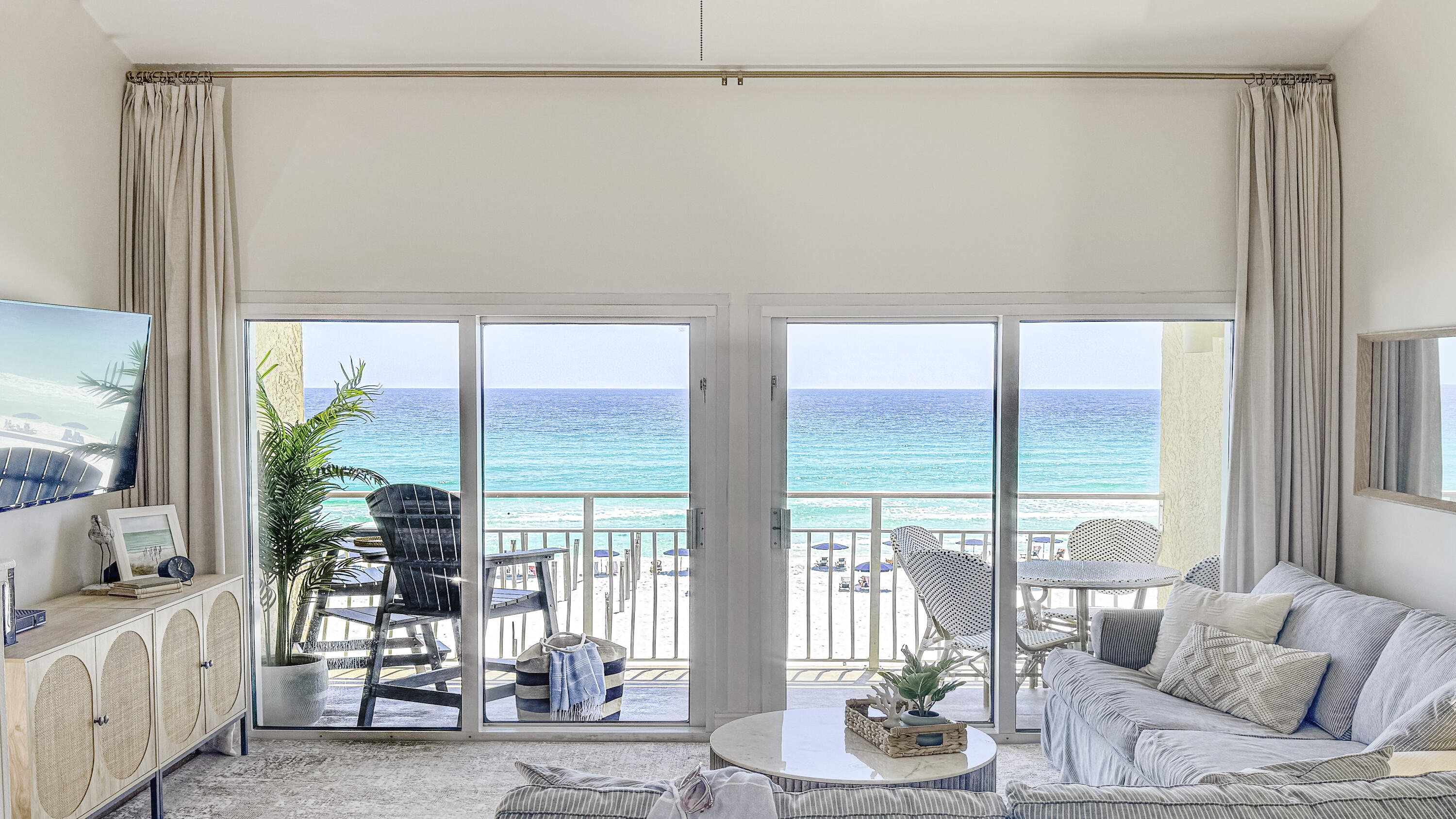 Experience true beachfront living in this fully renovated 3 bedroom, 2 bathroom condo located directly on Scenic Highway 98 in the heart of Destin.

Situated in a low density, three story building, this property offers a quieter, more private coastal experience with unobstructed Gulf views and easy beach access just steps away. Enjoy the convenience of elevator access, ample parking, and direct access to 2 heated pools, beachside grills, and beach service.

Located within walking distance to popular restaurants and cafés and adjacent to Henderson Beach State Park, this property combines beachfront privacy with convenient access to some of Destin's most desirable attractions. Positioned along a quieter stretch of Scenic Highway 98, it offers a more relaxed setting while still being close to everything.

Inside, the spacious two story layout features vaulted ceilings and comfortably sleeps up to 10 guests with 3 king sized beds, 2 twins, and a pull out couch. The condo has been fully renovated with an updated kitchen, newly painted interiors, smooth finished ceilings replacing the original popcorn texture, new flooring, remodeled bathrooms, and new hurricane impact glass doors, making it completely turnkey for personal use or rental.

This property shows strong rental performance with projected annual revenue of over $100,000 based on current bookings and repeat seasonal guests already booked into 2027 . During peak season, average nightly rates typically range from $850 to $1,154.

The building has successfully passed its structural milestone inspection and the HOA is well funded, providing added confidence and stability for future ownership.

Additional highlights include a new playground being developed nearby and scheduled exterior repainting of the building, which will further enhance the overall appearance and value of the property. The third floor location can also contribute to lower insurance costs compared to lower level units.

With its prime Scenic 98 location, full beachfront views, and proven rental demand, this is a rare opportunity to own a high performing coastal property in one of Destin's most sought after areas.