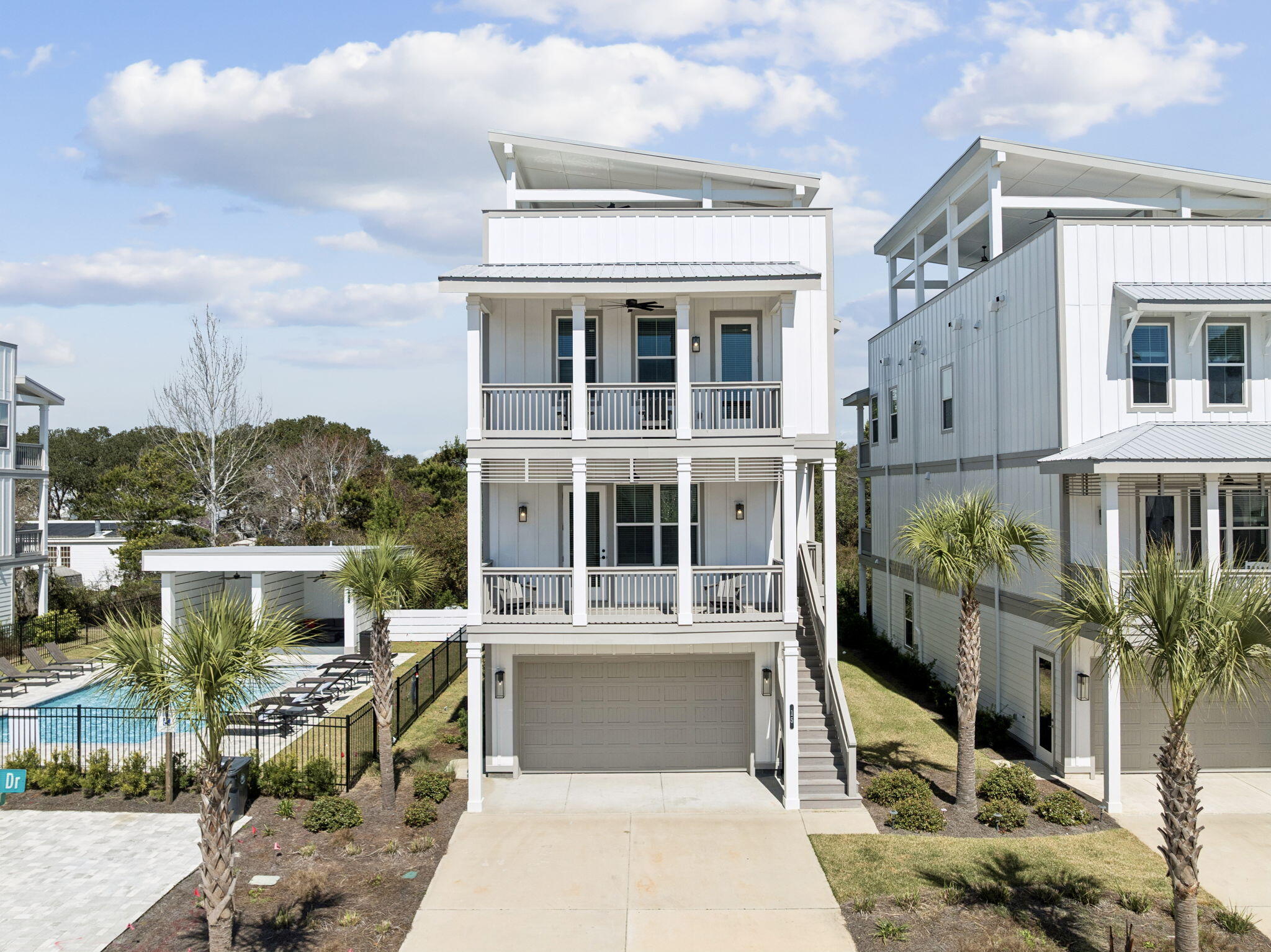 Discover 15 E Queen Palm Drive, a pristine 5-bedroom, 5 bathroom beach home in Inlet Beach. Built in 2023, this thoughtfully designed 3,045 square foot home embodies the ''coastal'' lifestyle with an open-concept layout and soaring ceilings that create an airy, expansive feel. The second floor serves as the heart of the home, featuring a chef's kitchen equipped with high-end appliances, including dual ovens, that flows seamlessly into the dining and family rooms-perfect for hosting family and friends. Step outside to find multiple covered balconies and a rooftop terrace that offers sweeping views, providing the ultimate backdrop for sunset cocktails or morning coffee. 

This home is well positioned within Twin Palms to maximize rental potential. Its most unique advantage is its location directly adjacent to the neighborhood swimming pool, offering guests "front door" access to resort-style amenities without the maintenance of a private pool. With spacious bedrooms on the 1st and 3rd floors-including a primary suite with a luxury en-suite bath-the home comfortably accommodates multi-generational families. The sugar-white sands of the Emerald Coast are close-by as well as the upscale shopping and dining of 30Avenue & Rosemary, this fully furnished turnkey property is perfectly situated to maximize rental yield and guest satisfaction.