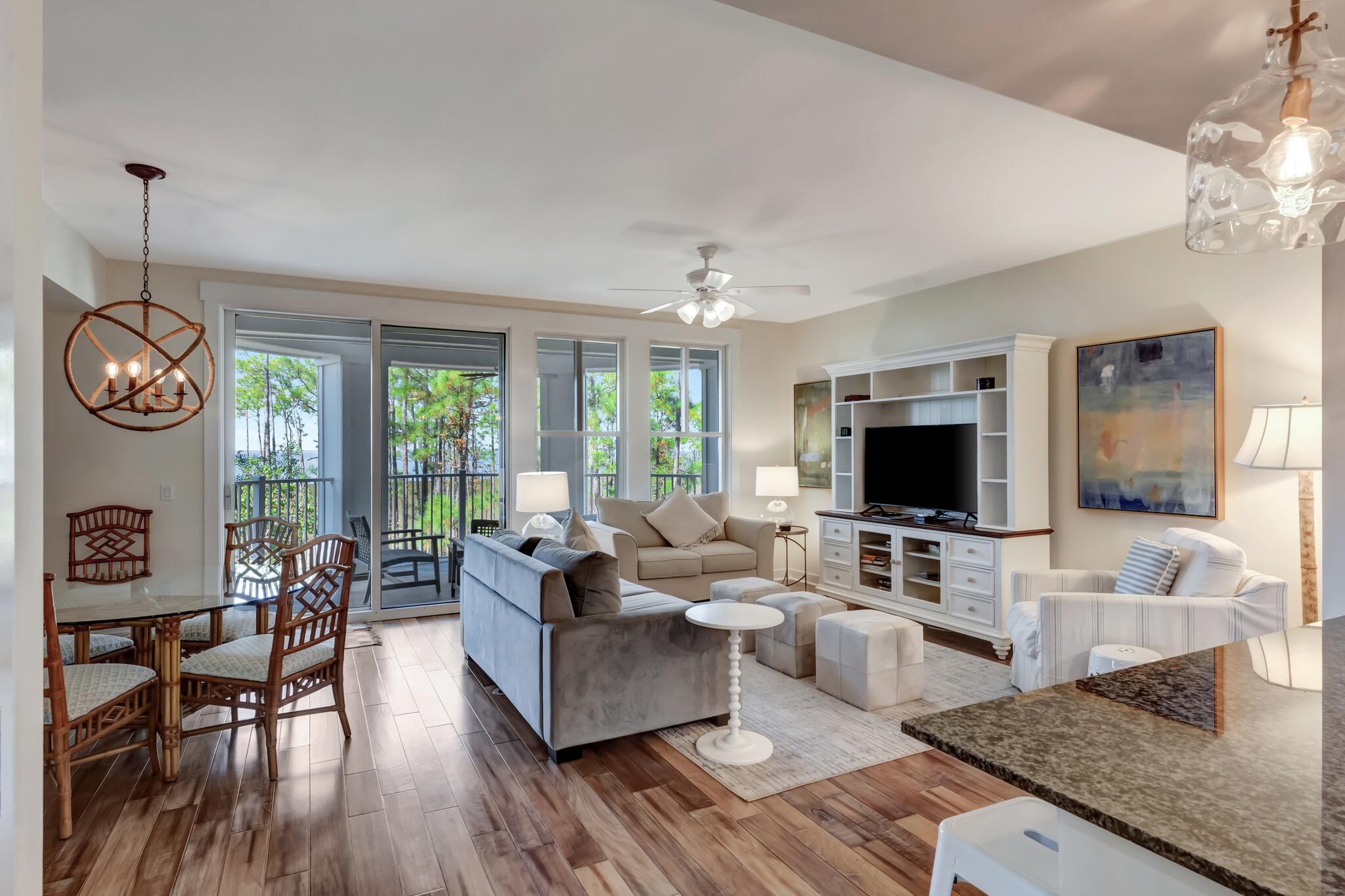Enjoy serene landscapes and stunning bay views from the spacious balcony of this immaculate second-floor unit at Bahia, within the Grand Complex of Sandestin Golf & Beach Resort. Recently updated and meticulously maintained, the open living/dining/kitchen area is flooded with natural light through floor-to-ceiling windows. Perfect as a primary residence, second home, or investment property, this condo offers endless possibilities. It includes a separate storage cage in the parking garage and conveniently located by the beautiful zero-entry lagoon-style pool, providing a true resort experience.