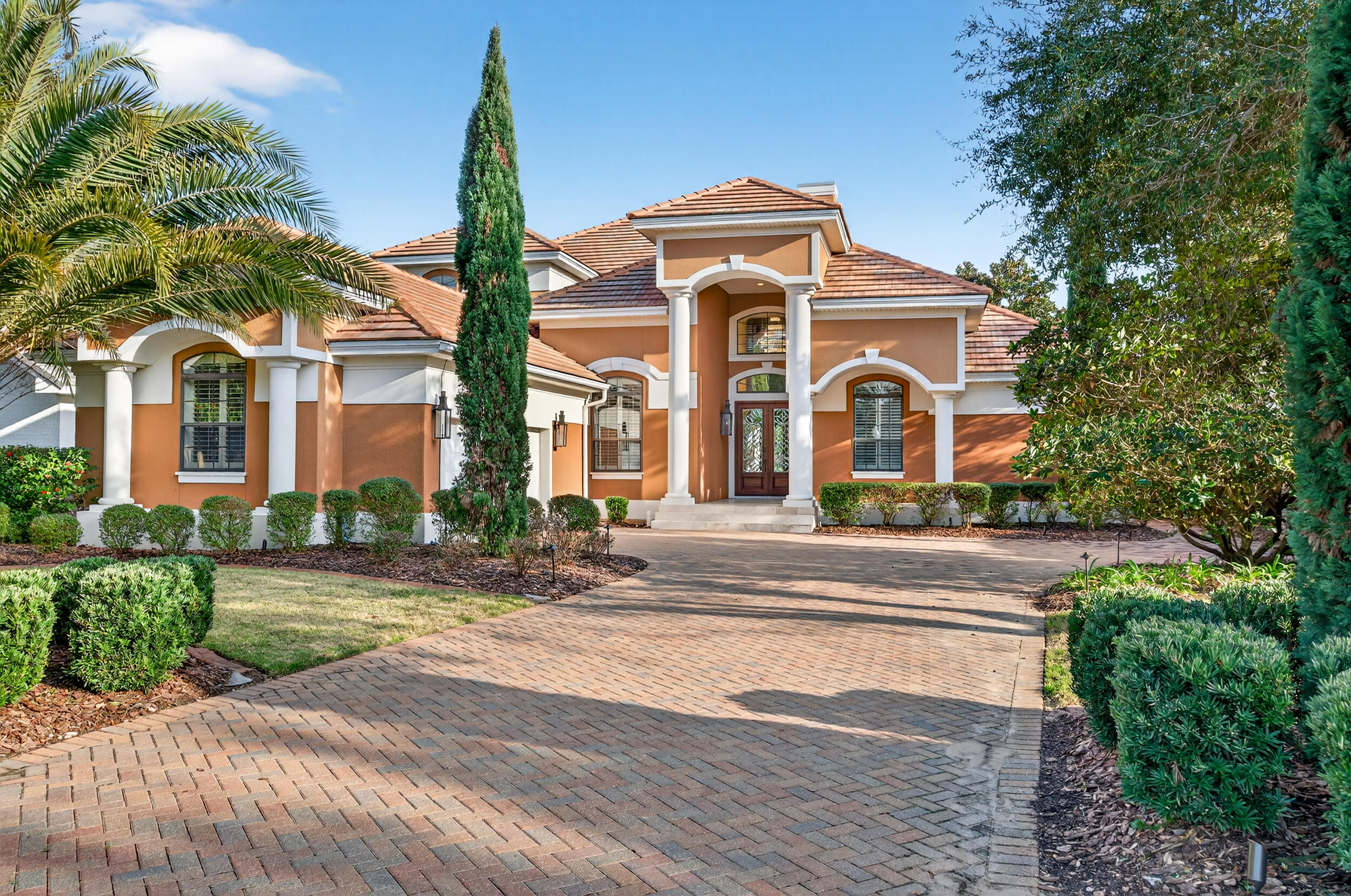 Luxury 4BR/4BA golf course home with lake views in the gated Regatta Bay community of Destin. Perfectly positioned along the 15th green of the award-winning 18-hole golf course, this private two-story residence features soaring 22-foot ceilings, a first-floor primary suite, dedicated office, remodeled heated pool and spa, outdoor kitchen, screened porch, renovated climate-controlled 2-car plus golf cart garage, new flooring throughout, and fully remodeled bathrooms.

The open-concept floor plan showcases crown molding, custom millwork, a dramatic 22-foot fireplace, quartz countertops, Wolf appliances, Sub-Zero refrigerator, and a luxurious primary suite with a spa-inspired bathroom, dual walk-in closets, and direct access to the pool area. Upstairs offers additional living space ideal for guests, a media room, or a second family room.

Just minutes from Destin's white-sand beaches, shopping, dining, and entertainment. Regatta Bay amenities include an 18-hole golf course, marina, boat launch, waterfront access, fishing dock, clubhouse, resort-style pool, tennis courts, pickleball courts, playground, game room, and 24-hour gated security. Pet-friendly community. No short-term rentals allowed.