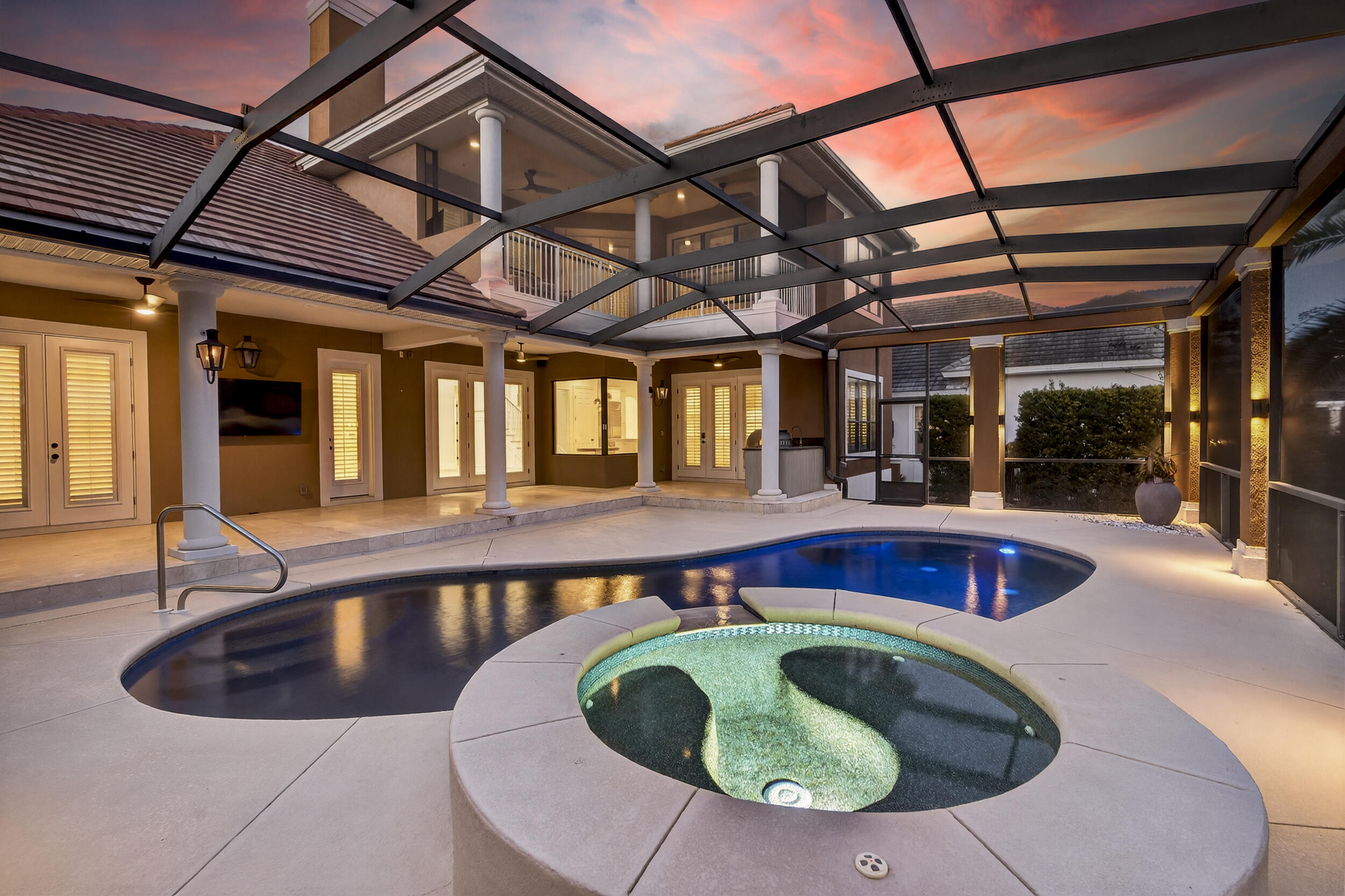 Luxury 4BR/4BA golf course home with lake views in the gated Regatta Bay community of Destin. Perfectly positioned along the 15th green of the award-winning 18-hole golf course, this private two-story residence features soaring 22-foot ceilings, a first-floor primary suite, dedicated office, remodeled heated pool and spa, outdoor kitchen, screened porch, renovated climate-controlled 2-car plus golf cart garage, new flooring throughout, and fully remodeled bathrooms.

The open-concept floor plan showcases crown molding, custom millwork, a dramatic 22-foot fireplace, quartz countertops, Wolf appliances, Sub-Zero refrigerator, and a luxurious primary suite with a spa-inspired bathroom, dual walk-in closets, and direct access to the pool area. Upstairs offers additional living space ideal for guests, a media room, or a second family room.

Just minutes from Destin's white-sand beaches, shopping, dining, and entertainment. Regatta Bay amenities include an 18-hole golf course, marina, boat launch, waterfront access, fishing dock, clubhouse, resort-style pool, tennis courts, pickleball courts, playground, game room, and 24-hour gated security. Pet-friendly community. No short-term rentals allowed.