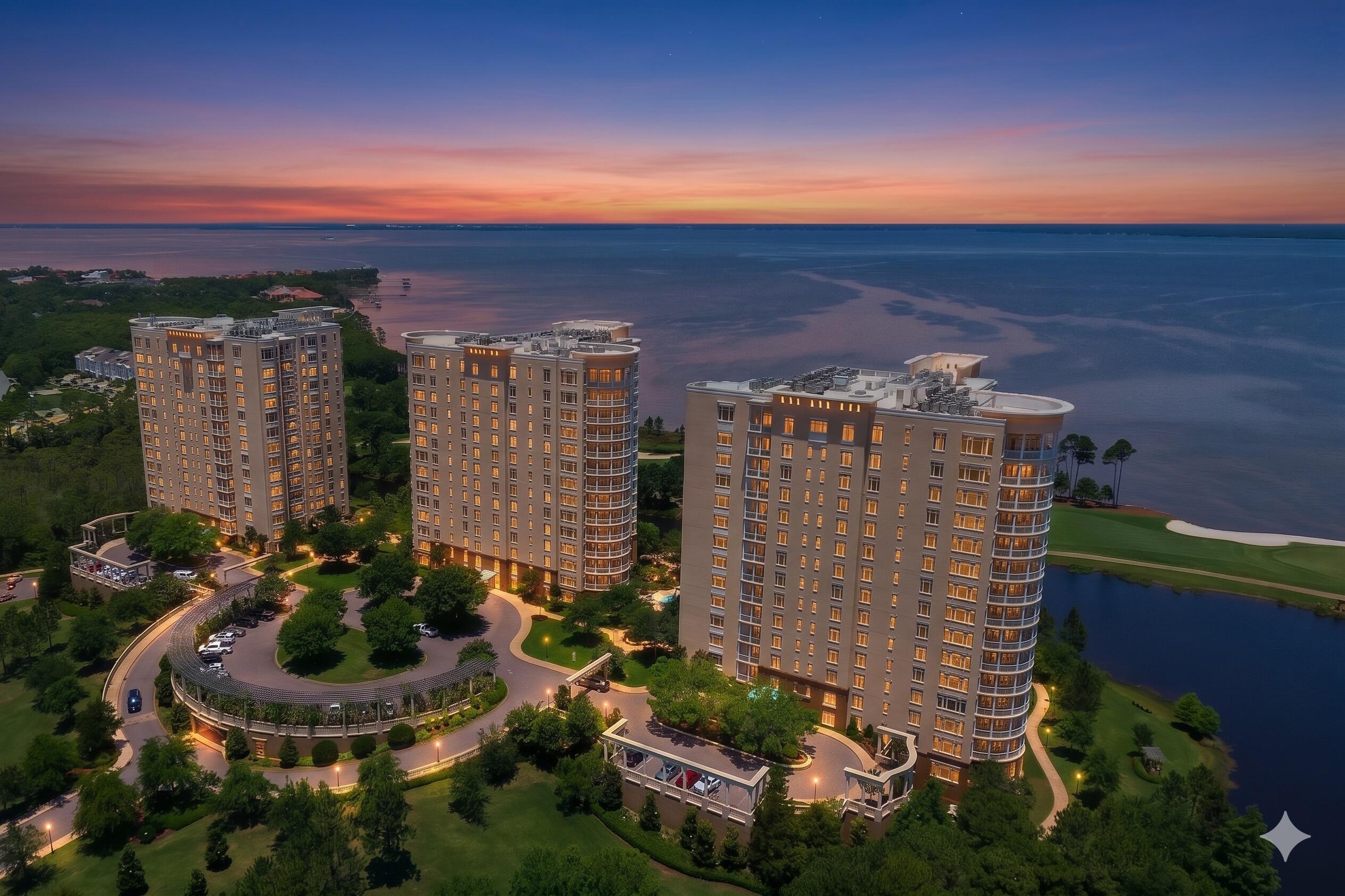 Welcome to One Water Place, Destin's premier address and luxury ownership at it's finest. Unit 1007 is located on the 10th floor of the center tower, offering stunning views of the Bay, Gulf, One Water Place swimming pool, Kelly Plantation Golf Course, and central Destin from it's massive 180 degree wrap-a-round balcony. This mostly furnished unit is the much desired Castleton floorplan, offering a spacious 3,220 square feet, large living room with gas fireplace, 3 bedrooms plus an office, luxurious kitchen featuring high-end appliances, and a formal dining room, all of which include breathtaking views from every angle. Recent improvements include in 2022 a new outdoor grill, in 2023 new wood flooring and carpet in the primary bedroom, in 2024 the unit was newly painted along with a new refrigerator and dishwasher, in 2025 a new ice maker was installed, and in 2023 a new California Closet upgrade was added to the primary walk-in closet and a new bar was added to the living room. This unit also comes with a much coveted GOLF CART PARKING SPACE and two assigned parking spaces in the underground garage. The amenities at One Water Place are unparalleled. They include semi-private elevators, swimming pools, huge fitness center and spa, owner's club room, billiards room, gardening facility, walking paths and fountains, underground parking, dog park, arts and crafts room, and guest suites in each building available for up to 7 nights. Kelly Plantation is the area's premier gated community, comprised of numerous parks, community pool, tennis and basketball courts, and an 18 hole championship golf course designed by Fred Couples that boasts over 7000 yards of gorgeous greens along miles of bay-front shoreline, lakes, and ponds. One Water Place is truly the best there is. Come take a look. Buyer to please verify all information contained herein.