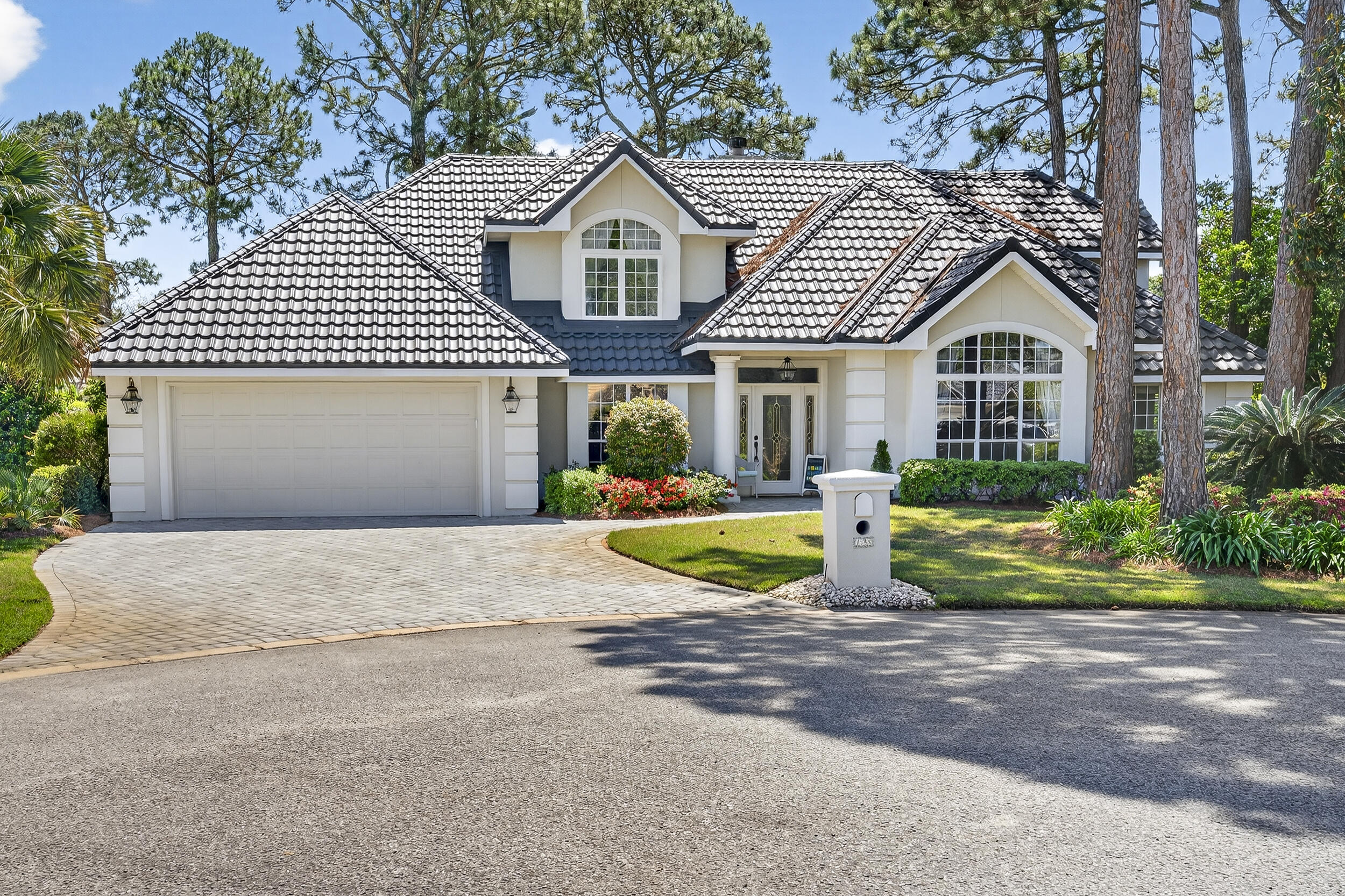 This stunning home is truly the jewel of the neighborhood--don't miss your opportunity to own it! Featuring 4 bedrooms, 2.5 baths, plus a dedicated office, this beautifully maintained property is located in the highly sought-after gated golf community of Emerald Bay. Tucked away on a quiet cul-de-sac along one of the community's most desirable streets, the home offers both privacy and charm. The backyard is a serene retreat, complete with a screened-in, heated saltwater pool--perfect for relaxing or entertaining. Enjoy your morning coffee from the breakfast area patio, surrounded by lush landscaping and fruit trees, including orange, grapefruit, and pear. The main living area is conveniently located on the first floor, along with the spacious primary suite. Upstairs, you'll find three additional bedrooms and a full bath, providing plenty of space for family or guests. Kitchen is equipped with VIKING applicances. This home is ideal as a primary residence or a second home getaway, and it has been meticulously maintained with key updates including: HVAC 2026, roof (2025), sprinkler pump (2025), pool pump (2024), pool resurfacing (2022), and upper new pool screen (2024). Emerald Bay offers exceptional amenities, including an 18-hole golf course, clubhouse, tennis courts, and a community pool--all just minutes from shopping, dining, and the beautiful beaches.