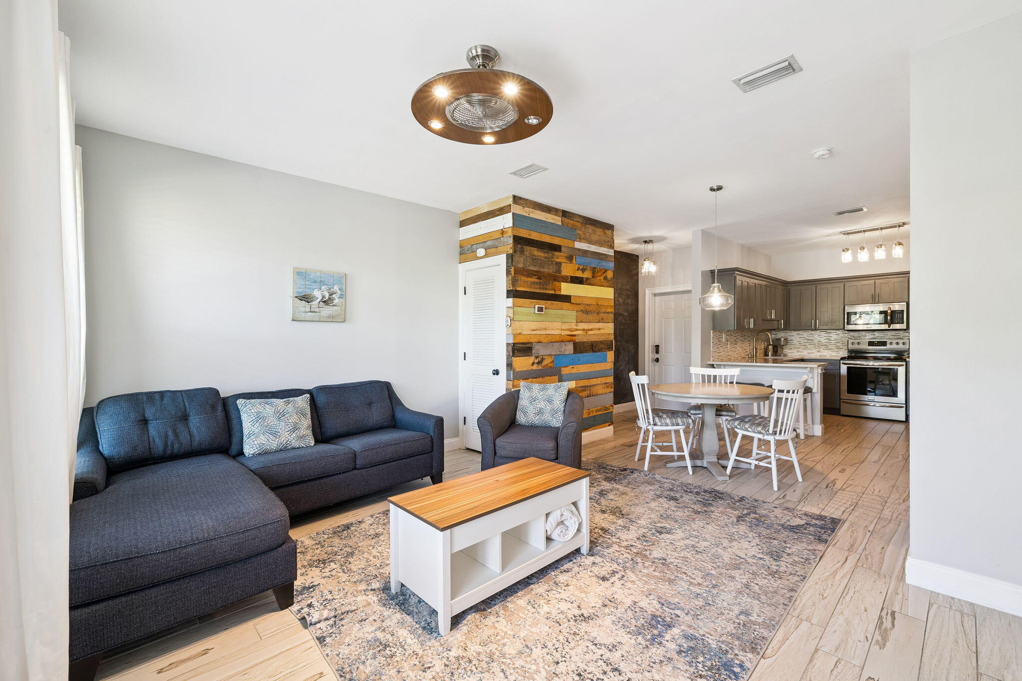 Set along the west end of Scenic Hwy 30A, this thoughtfully updated & fully furnished condo combines modern comfort with easy access to the Gulf. Inside, the open layout features updated flooring, paint, cabinetry, and appliances, creating a fresh, turnkey environment that feels both inviting and functional. The kitchen has been completely reimagined with new countertops, sinks, and fixtures, while the primary bath was redesigned to include a sleek glass-door shower and contemporary finishes.

Step through the back porch and onto the grassy common area, backing up to a trail system and state forestry. The spacious primary suite offers a king bed and private ensuite bath with a full walk in shower. The guest room features queen-sized bunks ideal for friends or family. Residents enjoy a relaxed coastal lifestyle with access to a community pool and large furnished sundeck. Beach days are effortless with direct access to Topsail Hill Preserve State Park just across the street. And when it's time to explore, nearby favorites like Stinky's Fish Camp, Stallworth Beach Access, and Dune Allen Beach Access are all minutes away. Enjoy Coastal Coffee & Cafe 30a in Topsail Hill Preserve State Park and nearby Publix & Walmart for added convenience.

Durable Hardie board exteriors, metal roofing, and dual-glazed windows add peace of mind and long-term value to this well-maintained community. Surrounded by nature trails, local shops, and art galleries, this home captures the best of 30A living in a convenient west-end location.