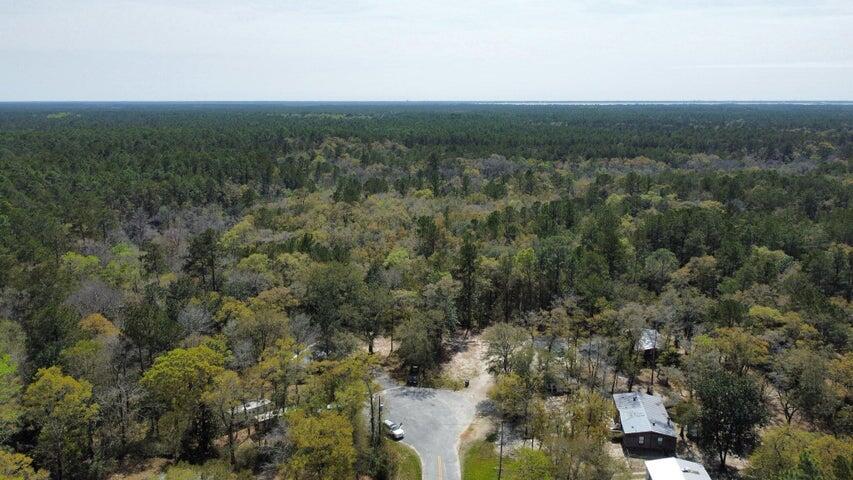 Rare land opportunity with flexibility already in place. This Canary Drive property is zoned Estate Residential and allows 9 primary uses, including: single-family residence, accessory dwelling, guest house, agricultural use, equestrian use, home occupation, private recreational amenities, conservation/open space, and estate-related accessory structures (buyer to verify).The property includes legal access rights through the cul-de-sac, adding established entry and long-term value. Located in a quiet, low-traffic setting, this parcel offers privacy while remaining easily accessible. With favorable zoning and access secured, much of the groundwork is complete. Ideal for a custom estate, futue development, or strategic investment. Bring your vision opportunities like this are increasing rare