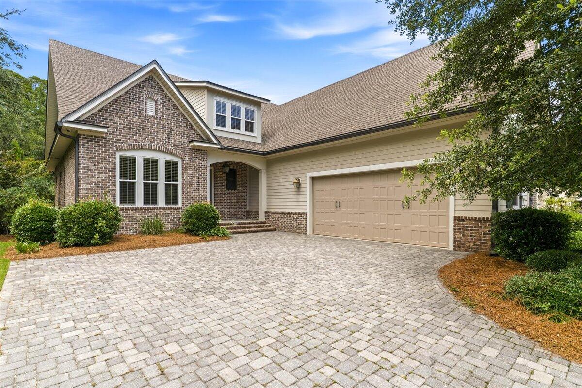 Award-winning luxury awaits in the prestigious waterfront community of Water's Edge! Formerly the 2018 Parade of Homes First Place Winner and the original model home, this exceptional Randy Wise-built residence offers 3,096 square feet of thoughtfully designed living space with 3 bedrooms, 3.5 baths, a private study, and a spacious upstairs bonus room with a full bath--ideal for guests, a media room, home office, or flex space. Designer details include exposed wood beams, brick and wood accent walls, custom barn doors, elegant lighting, and an open-concept layout filled with natural light. The chef's kitchen features quartz countertops, custom cabinetry, premium appliances, and an oversized island perfect for entertaining. The luxurious primary suite offers a spa-inspired bath, while smart home technology and a Generac whole-home generator provide modern convenience and year-round peace of mind. Enjoy the beautifully landscaped outdoor living space or take advantage of Water's Edge amenities, including private Rocky Bayou access, a community dock, kayak launch, and waterfront gathering areas. Conveniently located near Eglin AFB, shopping, dining, top-rated schools, and the Emerald Coast's white-sand beaches, this one-of-a-kind home offers the perfect blend of luxury, lifestyle, and coastal living.