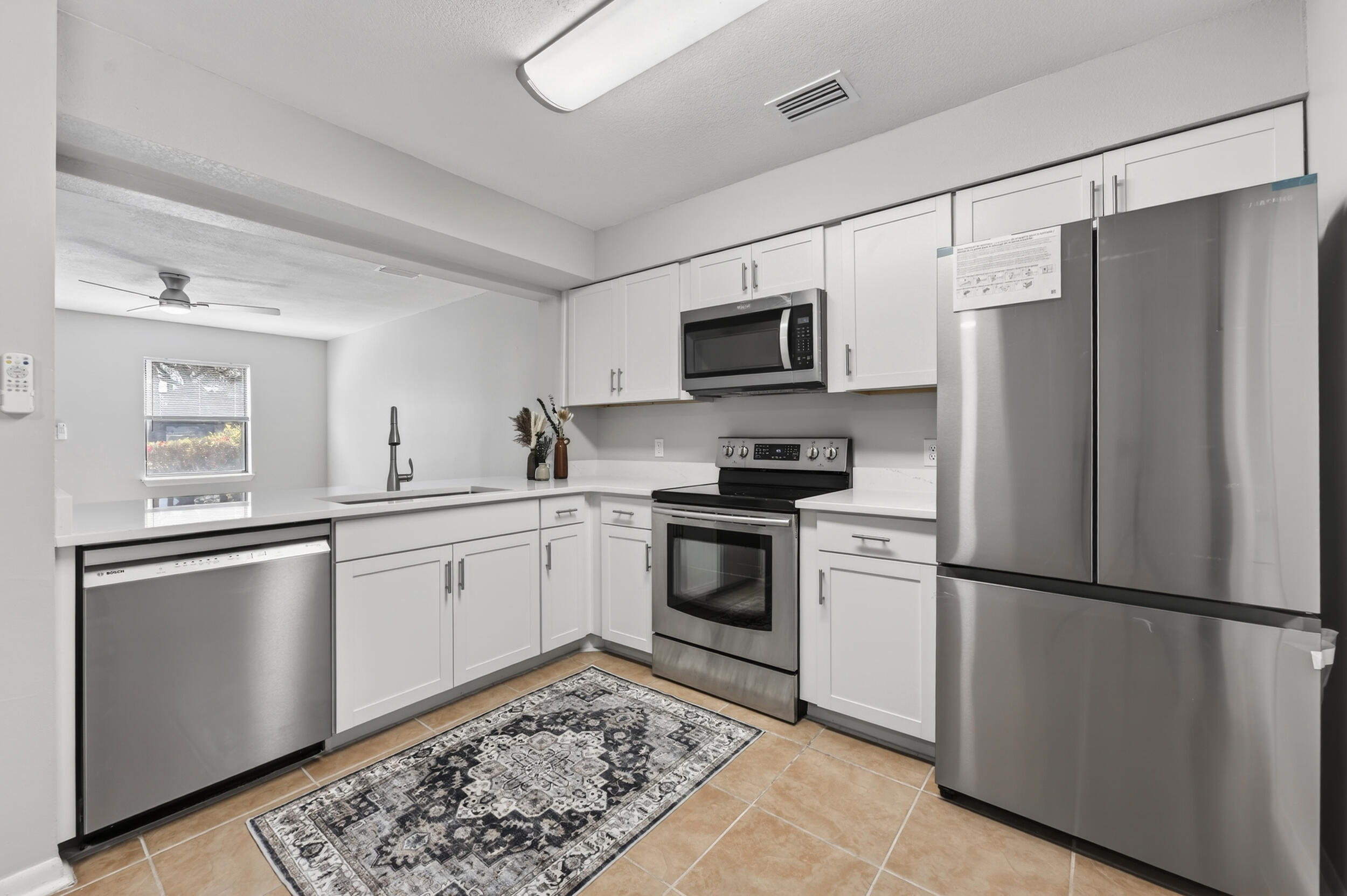 Fully Remodeled, Move-In Ready Townhome with Designer Finishes & Private Outdoor Living. Welcome home to this beautifully renovated townhome in the quiet, centrally located community of Tyner Villas, where modern upgrades, low-maintenance living, and exceptional value come together. Perfect for first-time buyers, investors, or anyone looking to downsize without sacrificing style, this home is truly move-in ready.
Step inside to an inviting open-concept floor plan featuring luxury vinyl plank and tile flooring throughout--completely carpet-free for easy maintenance and timeless appeal. The updated kitchen shines with elegant quartz countertops, stainless steel appliances, a side-by-side Samsung refrigerator with ice maker, and a premium Bosch dishwasher.
The living space seamlessly extends outdoors to a private fenced area complete with a fire pit, outdoor seating space and TV mount, creating the perfect setting for relaxing evenings or entertaining friends and family. 
Upstairs, you'll find two spacious bedrooms, including an oversized walk-in closet that provides abundant storage. The bathrooms have also been fully remodeled with quartz vanity tops and modern finishes, adding a touch of luxury throughout the home. Major improvements offer peace of mind for years to come, including a newer HVAC system (2024), roof replacement (2021), and a newer water heater.
Residents of Tyner Villas enjoy ample parking and access to a large shared green space with a picnic gazebo--ideal for pet owners, outdoor activities, and community gatherings.
Call your favorite real estate agent and come see this stylish, affordable, and centrally located townhome today!
Buyer and buyer's agent to verify all information and dimensions deemed important.