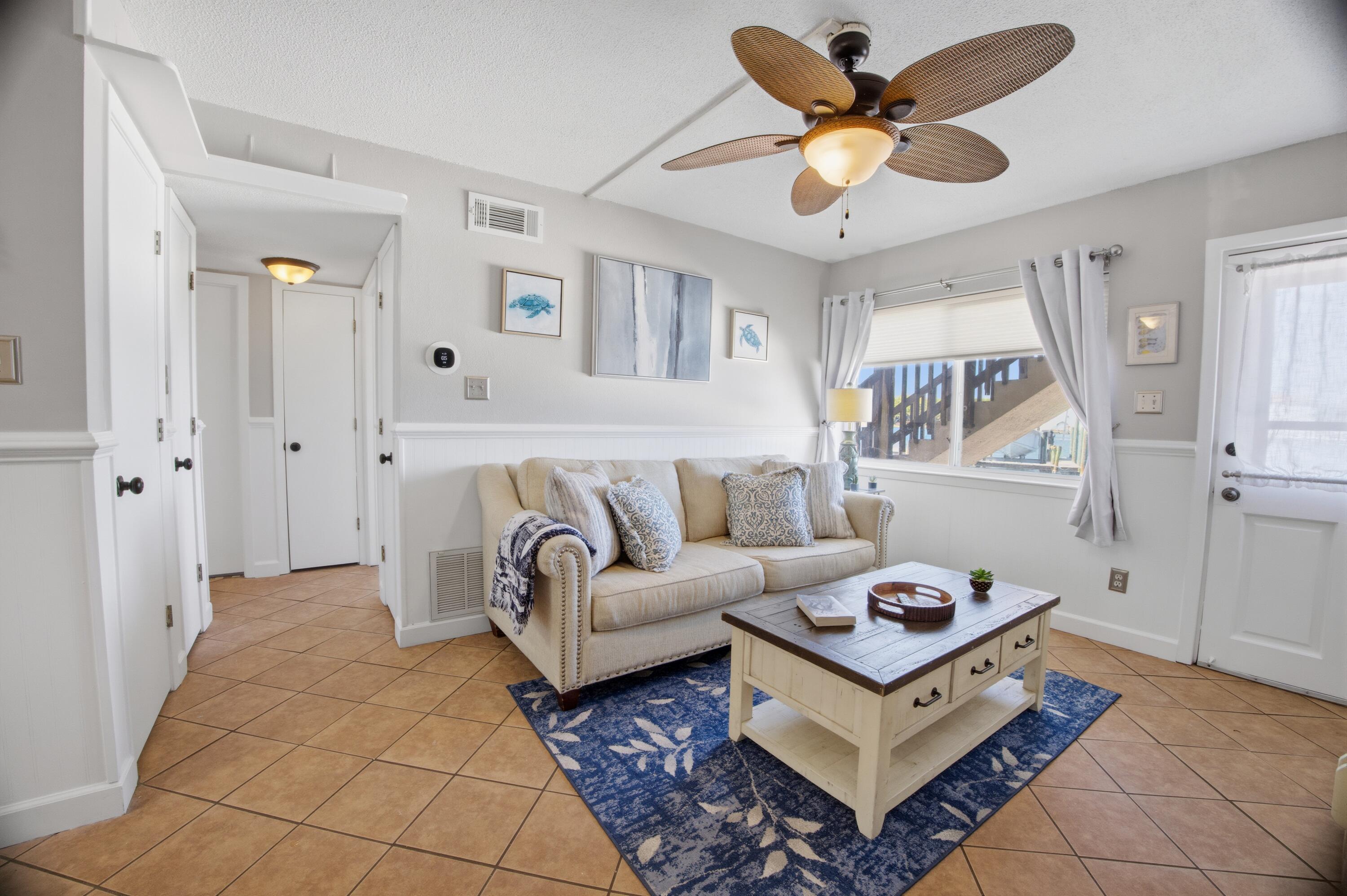 VA Approved and your BOAT SLIP is leasable to the public if you don't have a boat. LOW HOA with this Short Term Rental on the sound. Experience easy coastal living in this beautifully updated first-floor sound side waterfront condo on Okaloosa Island. Offering the perfect blend of comfort, convenience, and waterfront views, this unit is ideal as a primary residence, vacation getaway, or investment opportunity. Inside, the condo has been recently repainted and features thoughtful upgrades throughout. The kitchen includes a recently replaced garbage disposal, while major systems provide added peace of mind with a new HVAC system and circuit breaker box (Oct 2024) and a water heater installed in 2020. The bathroom has been refreshed with a new vanity, and closets have been redone for improved storage and functionality. A new picture window (installation scheduled for end of April) will further enhance natural light and highlight the setting. Additional features include keyless entry and Ring cameras covering doors and windows, with rechargeable batteries (extra batteries provided). Located on the first floor for easy access, this sound side unit offers tranquil views across the water toward downtown Fort Walton Beach; perfect for enjoying seasonal fireworks and boat parades at the Landing. Community amenities include a small private beach for residents, a small boat launch (currently in works to be repaired), community laundry room and an assigned boat slip (leasable) with electricity and running water at the dock. Conveniently situated near public Gulf beach access, as well as local restaurants, shopping, and entertainment, this property combines coastal charm with everyday practicality in a highly desirable location.
