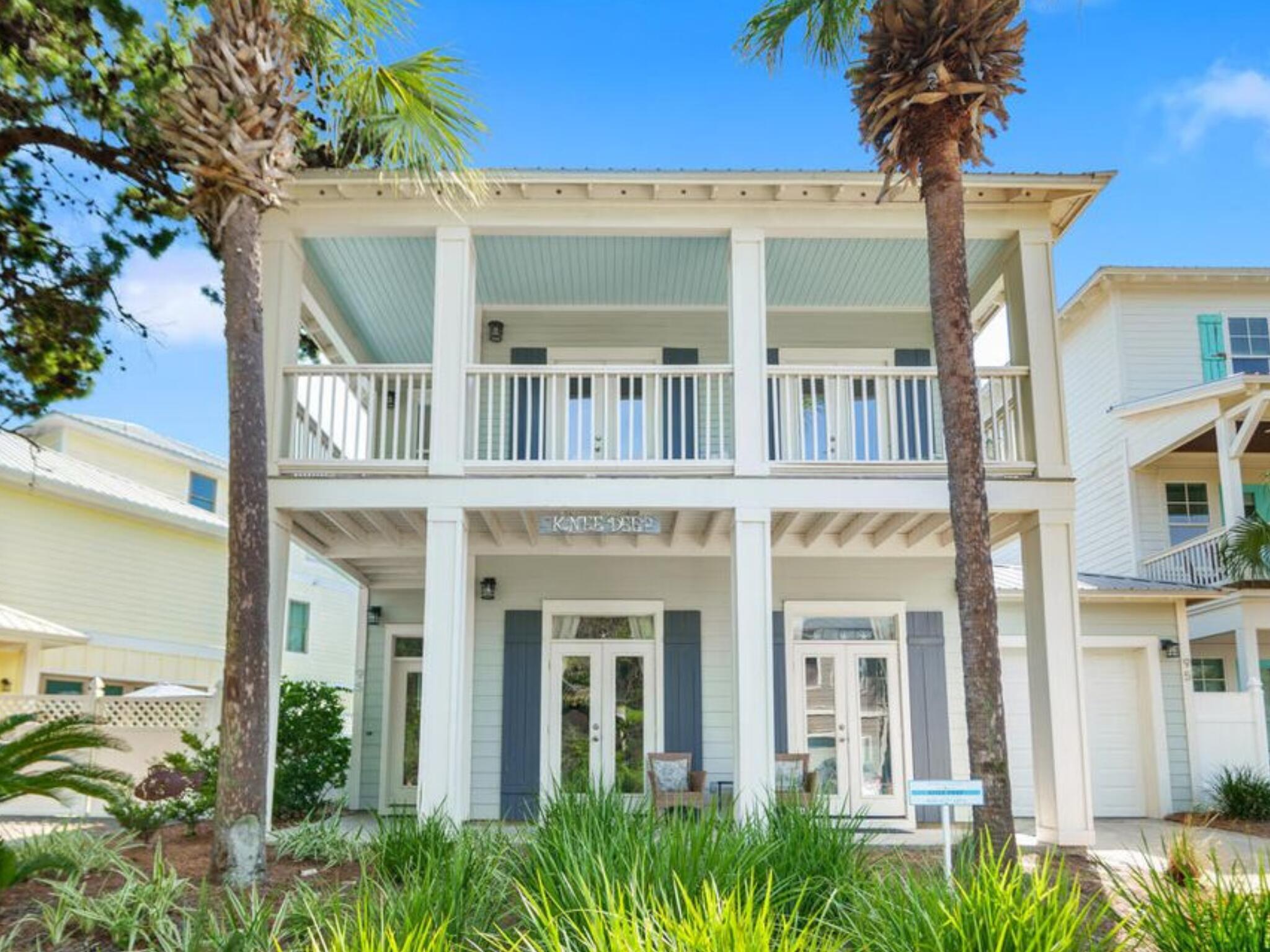 Located in the gated, Gulf-side community of Emerald Waters Village, this beautifully designed coastal home offers an exceptional opportunity to enjoy the Miramar Beach lifestyle at an attractive price point. Just a short walk from deeded beach access, the property combines solid concrete block construction, thoughtful design, and inviting living spaces in one of the area's most desirable neighborhoods.
The main living level is bright, open, and designed for gathering. Large windows and high ceilings allow natural light to pour in, creating an airy, welcoming atmosphere throughout the living, dining, and kitchen spaces. The open-concept layout makes entertaining effortless, whether hosting family and friends or enjoying a relaxed evening after the beach. The kitchen features granite countertops, stainless steel appliances, and a breakfast bar that keeps the space connected and social. A spacious first-floor bedroom with an ensuite bath offers flexibility for guests or extended stays, while a laundry room and one-car garage add everyday convenience. Upstairs, the primary suite serves as a private retreat with a sitting area and access to a covered balcony a perfect spot for morning coffee, sunset views, or quiet moments between beach days. Two additional bedrooms share a Jack-and-Jill bath, providing comfortable accommodations for family or guests. Outdoors, the fenced backyard and patio extend the entertaining space, offering a private setting for grilling, gathering, or simply enjoying the coastal breeze. Emerald Waters Village features gated entry, two community pools, and walkable beach access, all just minutes from Scenic Highway 98, Silver Sands Premium Outlets, dining, and entertainment. Whether envisioned as a primary residence, second home, or investment property, this home delivers location, light-filled living, and a beach lifestyle that is increasingly hard to find at this price point in Miramar Beach.