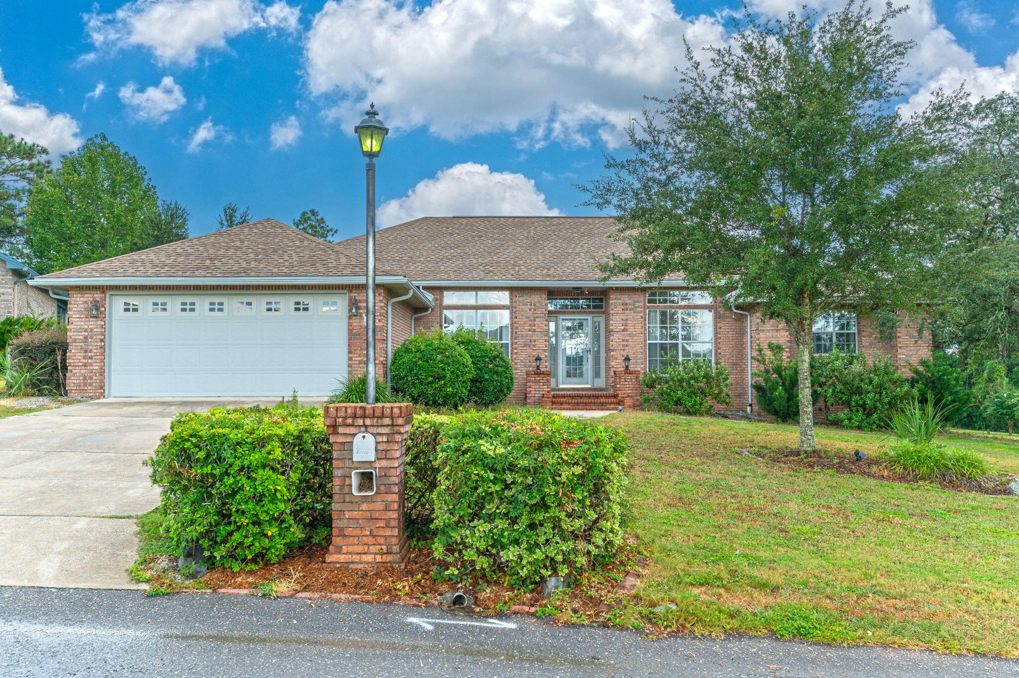 Spacious 5 bedroom home with separate quarters for multi-generational living! Located on a quiet cul-de-sac in south Crestview, this home has the perfect layout! Soaring ceilings, dual living rooms and split floorpan. No carpet in all the main areas and wall-to-wall windows in the family room. The kitchen features stainless appliances to include a glass top stove and granite countertops. Master bedroom has a stunning double trey ceiling, garden tub and walk in shower and dual closets, with additional toilet room.  Downstairs features the basement level with a bedroom and bathroom, separate HVAC unit, private patio and external access. Enjoy the picturesque views from the deck overlooking the fenced in backyard or relax in the gazebo and covered space. Set-up for an outdoor kitchen with covered space, and two car garage. Additional storage in the workshop/shed in the backyard. Home has a tankless-Gas Rinnai water heater, Dual HVAC (2018 & 2019).  And a 2022 Roof.