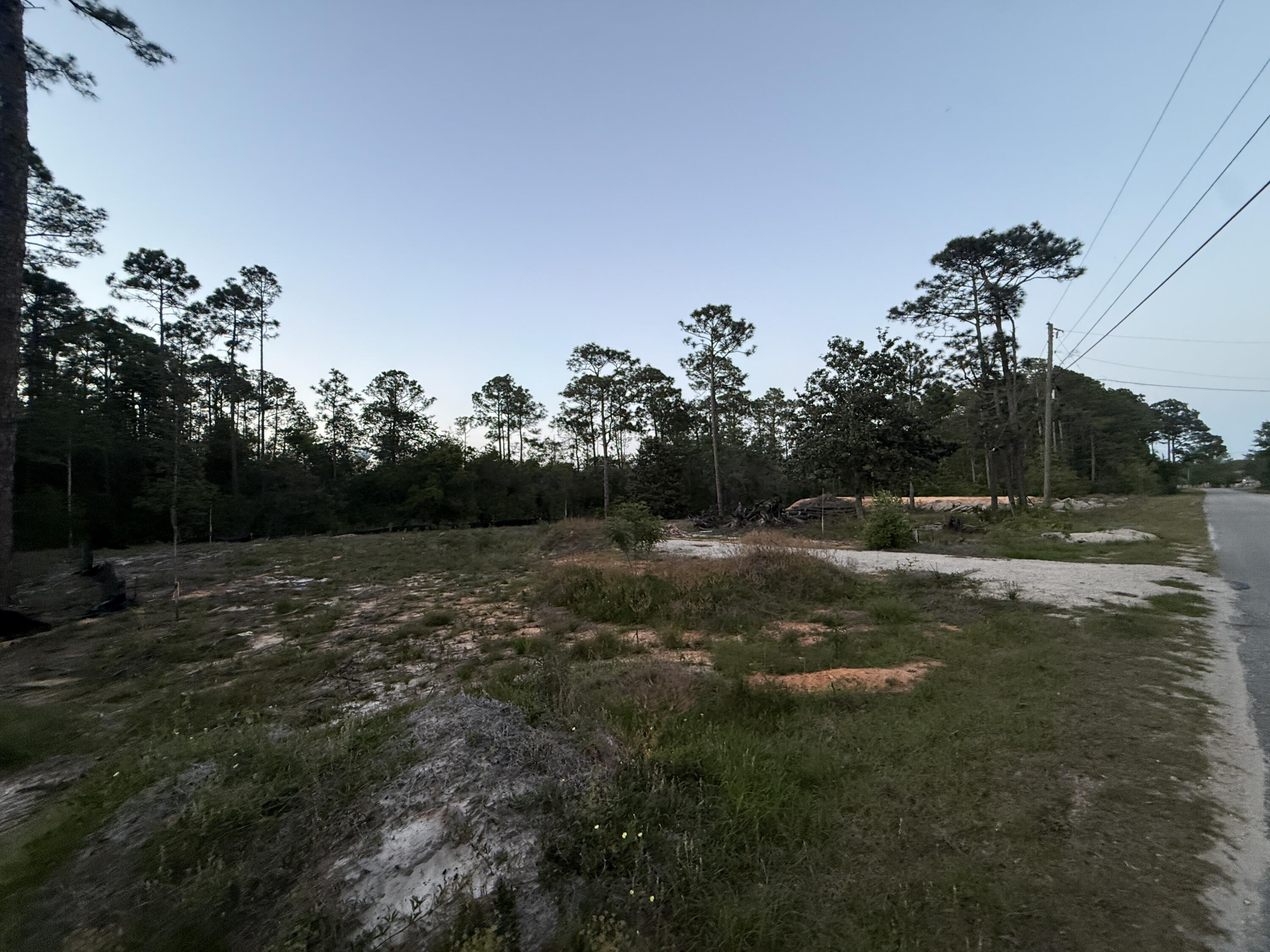 2 Beautiful lots within a 3-5 minute drive of Navarre High School. Each lot is just over 1 acre.
Quiet neighborhood with convenient access to shopping and just minutes to Navarre Beach! Buyer or Buyer's agent to verify all information deemed important.