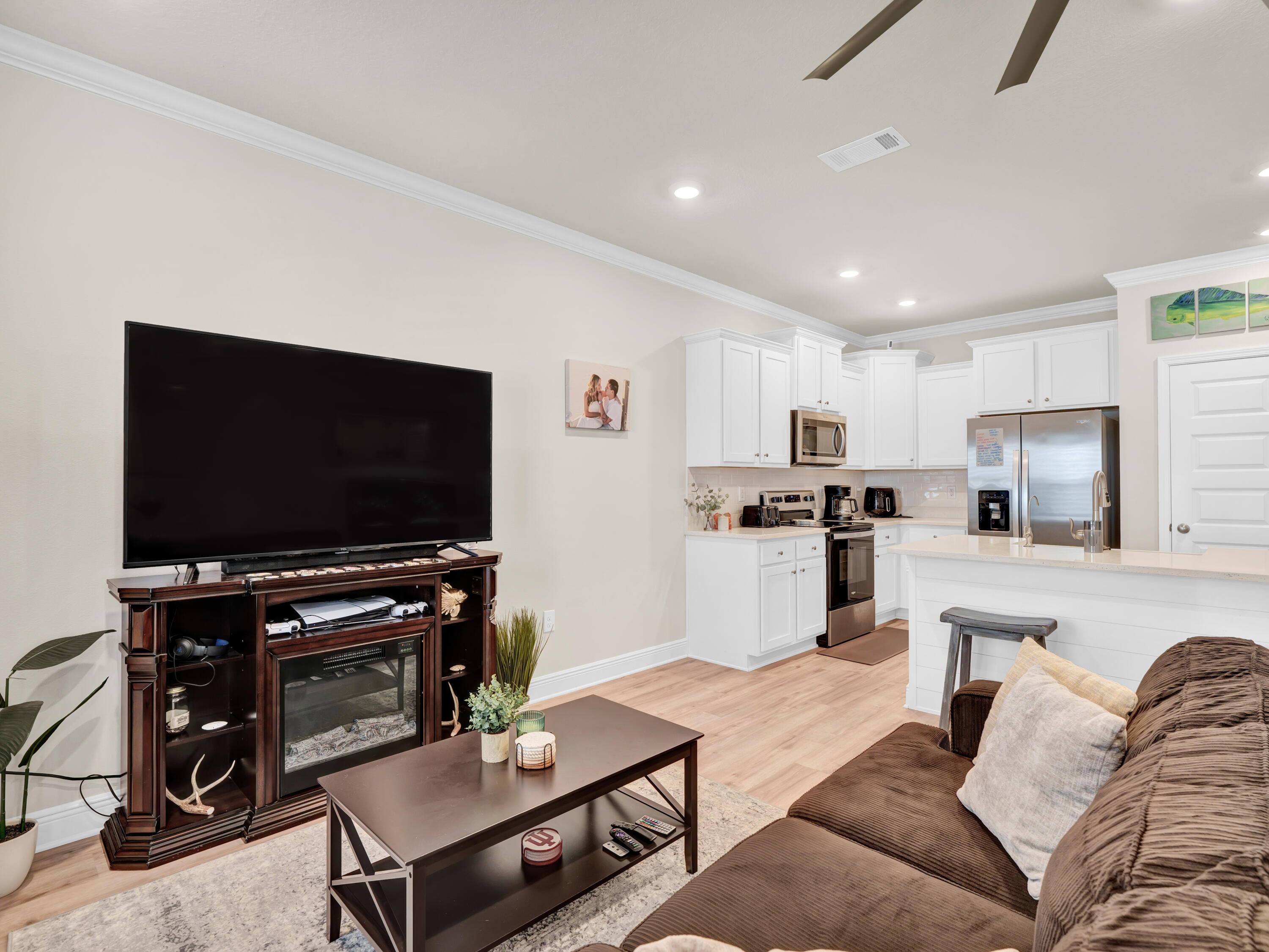 Situated in the heart of West Destin, this townhome is a prime example of Location AND luxury. This beautiful 3 bed/2.5 bath coastal townhome is steps away from HarborWalk Village, iconic restaurants, live entertainment, Crab Island, and the Emerald Waters of the Emerald Coast.

Boasting an open floorplan, quartz countertops, raised ceilings, oversized kitchen island, stainless steel appliances, Full Size Washer and Dry on the 2nd floor, and the list goes on. All vinyl plank flooring - no carpet. Generous walk-in closet in master suite.

Upgrades and Improvements include: shiplap accent walls, crown molding, custom floor-to-ceiling curtains, modern ceiling fans, kitchen backsplash, and plantation shutters in every room. Come and experience this luxurious property in the heart of Destin!
