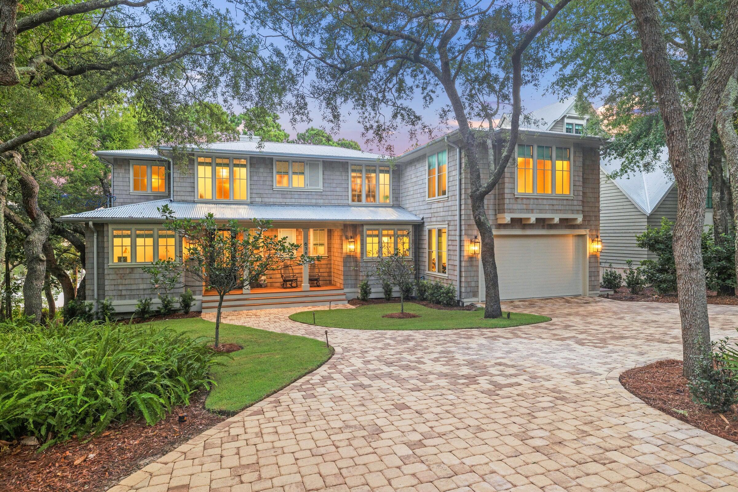 Ideally situated on Lake Powell, 638 N Walton Lakeshore Dr offers the perfect blend of coastal charm and modern comfort with direct boat access to the beach. The open-concept living area is filled with natural light and features warm coastal finishes, while the gourmet kitchen includes stainless steel appliances, stone countertops, and an oversized island--great for entertaining. The spacious primary suite provides a relaxing retreat with a spa-inspired bath. Enjoy outdoor living on the covered porch, landscaped yard, and your private dock with a boat lift, complete with a center-console fishing boat included. Located just minutes to 30A shopping, dining, Camp Helen, and the area's white-sand beaches, this home offers the ultimate Lake Powell and 30A lifestyle for full-time living or aprivate coastal getaway.
