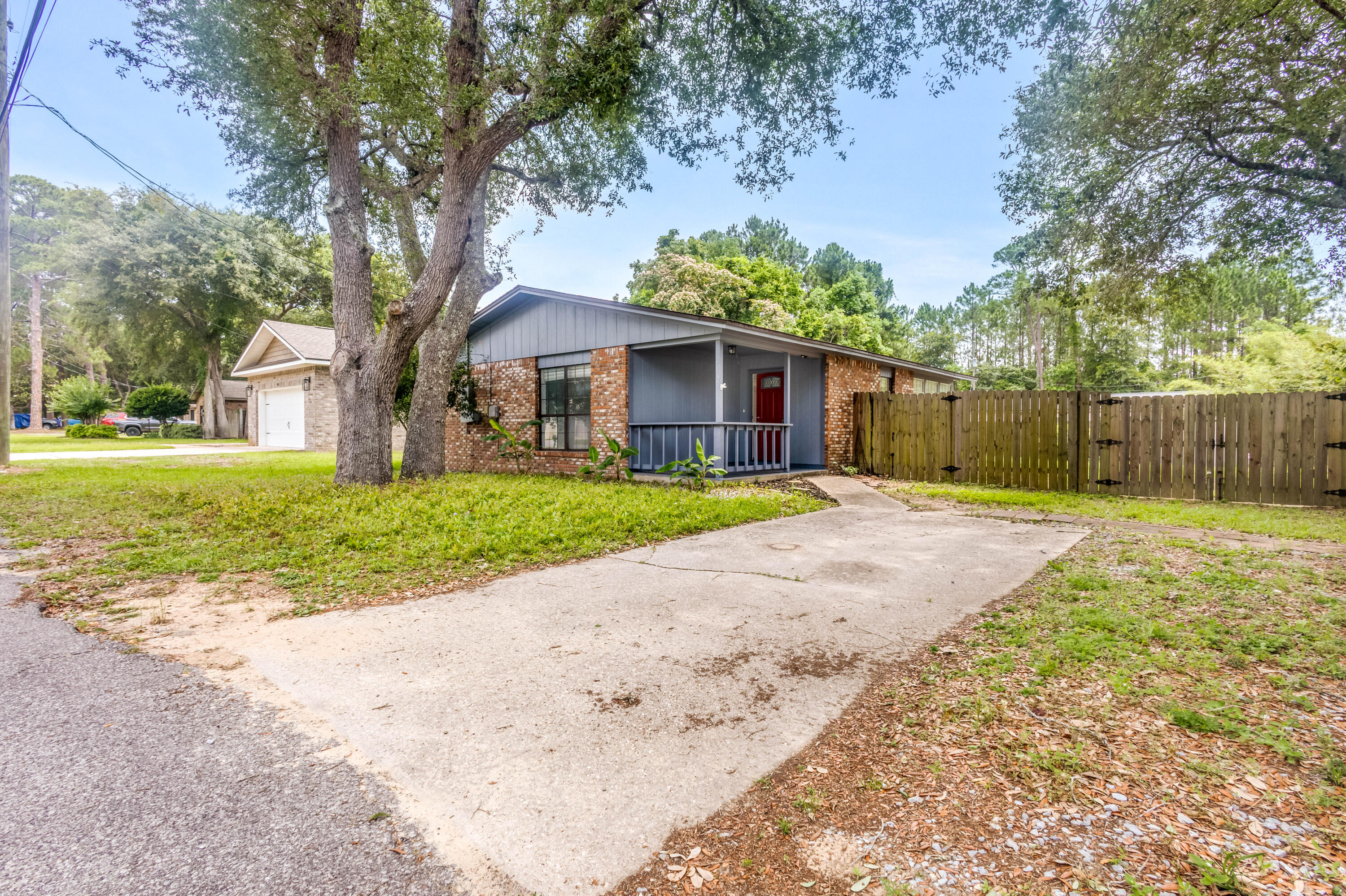 Come check out this beautiful, well-maintained home in West Mary Esther! This two bedroom, 1,032 sq ft home showcases many features and could be a great investment opportunity or cater to a variety of buyer's needs. The home features LVP flooring throughout, a kitchen that includes stainless steel appliances, updated cabinetry and granite countertops, a covered front porch and a spacious sun room that overlooks the fenced backyard with gorgeous landscaping lining the back side of the house. The property is located within 4 miles of Hurlburt Field and within 16 miles of Eglin AFB. To the west towards Navarre, the home is located within 5-6 miles of Publix Supermarket & Walmart Supercenter, and within 10 miles of Navarre Beach. To the east towards Fort Walton Beach, the home is located within 6-7 miles of Target and other shopping & restaurants, as well as being within 10 miles of Okaloosa Island. Schedule your showing today!