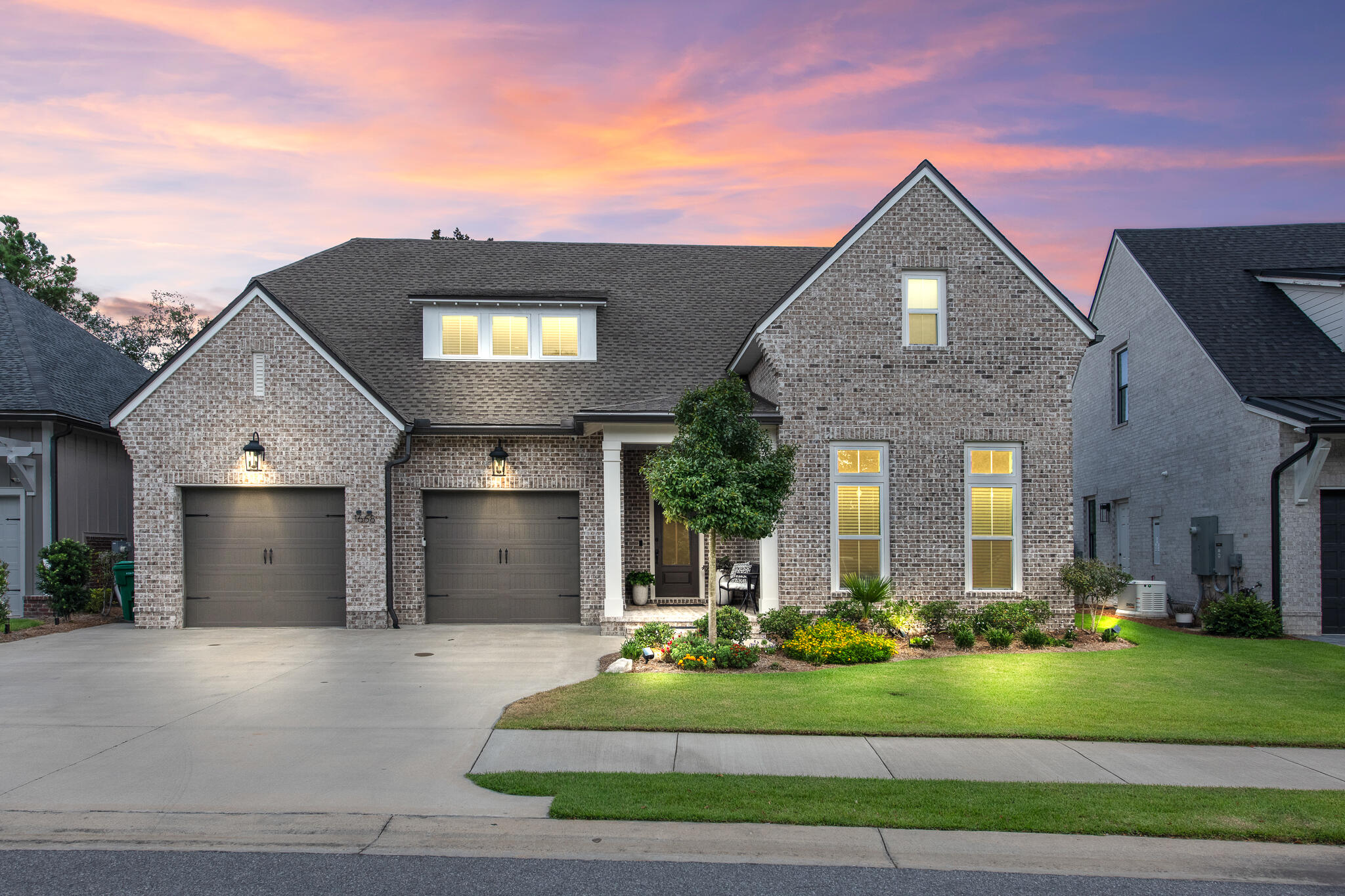Welcome to 1668 Ella Lane, a thoughtfully designed Southern-style residence in Fate's Landing at Bluewater Bay, where spacious first-floor living meets timeless elegance. Built by renowned local builder Randy Wise Homes this 3,807-square-foot home offers a floor plan that seamlessly balances everyday comfort with effortless entertaining. A true foyer with custom built-in shelving creates a warm and inviting first impression, leading into the home's open-concept living spaces. The living room serves as the heart of the home, anchored by a striking focal wall featuring a gas fireplace with a brick surround, custom built-in cabinetry, and ample space for gathering with family and friends. Designed with both function and hospitality in mind, the chef's kitchen offers exceptional flow and versatility. Features include a gas range, built-in wall oven and microwave, granite countertops, a counter-height breakfast bar, and abundant prep space. Thoughtful additions such as a wine and beverage cooler and a butler's pantry enhance the entertaining experience while preserving the home's open and connected feel. The first-floor primary suite provides a private retreat, complete with separate his-and-her walk-in closets and a spacious ensuite bath featuring a double vanity and generous storage. Also located on the main level are two additional bedrooms connected by a Jack-and-Jill bathroom, a dedicated home office, a spacious laundry room, and a convenient powder bath for guests. Upstairs, a second living area creates the perfect gathering space for family and guests while providing separation and privacy between two additional bedrooms, each featuring its own en-suite bathroom. A bonus room offers flexibility as a second home office, hobby room, fitness space, or media room to suit your lifestyle. Thoughtfully designed for storage, the walk-in attic has been finished into an expansive storage area, providing ample room for holiday décor, seasonal items, and everything you want tucked away but easily accessible.  

Additional features include a two-car garage with built-in storage systems, Electric Car Charging System, as well as a whole home Generac Generator. The expansive back patio provides a seamless extension of the living space complete with outdoor kitchen and offers ample room for the addition of a future pool. 

Nestled on a quiet street of just 21 homes, Fate's Landing is tucked just off Bay Drive and follows the gentle curve of a former golf fairway, creating a peaceful setting surrounded by nature. Every home backs to a protected wetlands conservation area, offering privacy and beautiful natural views, while a community park awaits at the end of the cul-de-sac.